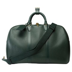 Classy Louis Vuitton Kendall 50 strap Travel bag in Green Taïga leather , GHW