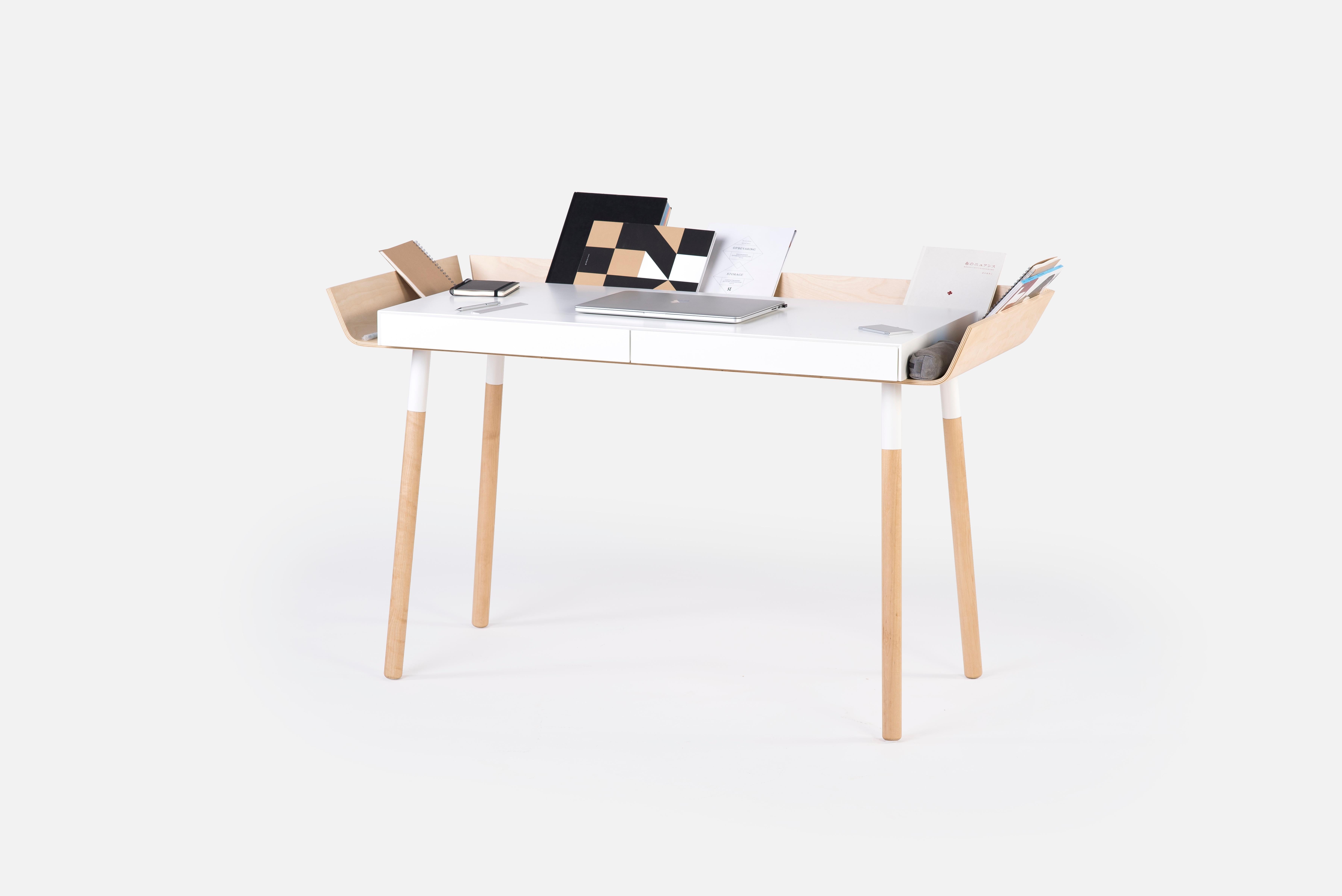 A writing desk, designed for working people. For creative people. People who know the value of efficient work.

While developing the idea of the My Writing Desk (MWD), designer Inesa Malafej had a clear goal – to reduce the chaotic clutter that