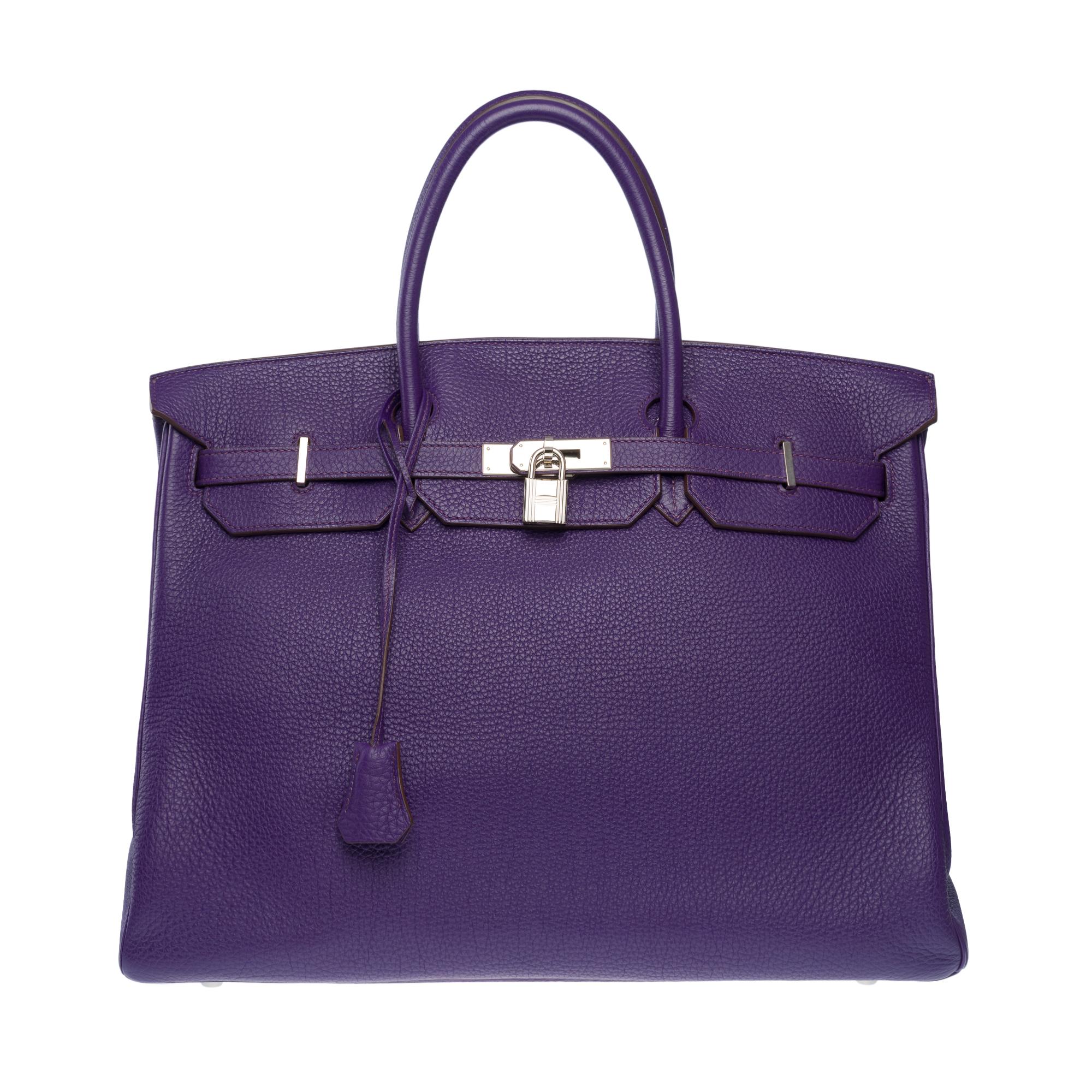 Beautiful​ ​Hermes​ ​Birkin​ ​40​ ​in​ ​Iris​ ​Togo​ ​leather,​ ​palladium​ ​silver​ ​metal​ ​trim,​ ​double​ ​handle​ ​in​ ​purple​ ​leather​ ​allowing​ ​a​ ​hand​ ​carry

Flap​ ​closure
Interior​ ​lining​ ​in​ ​purple​ ​leather,​ ​a​ ​zippered​
