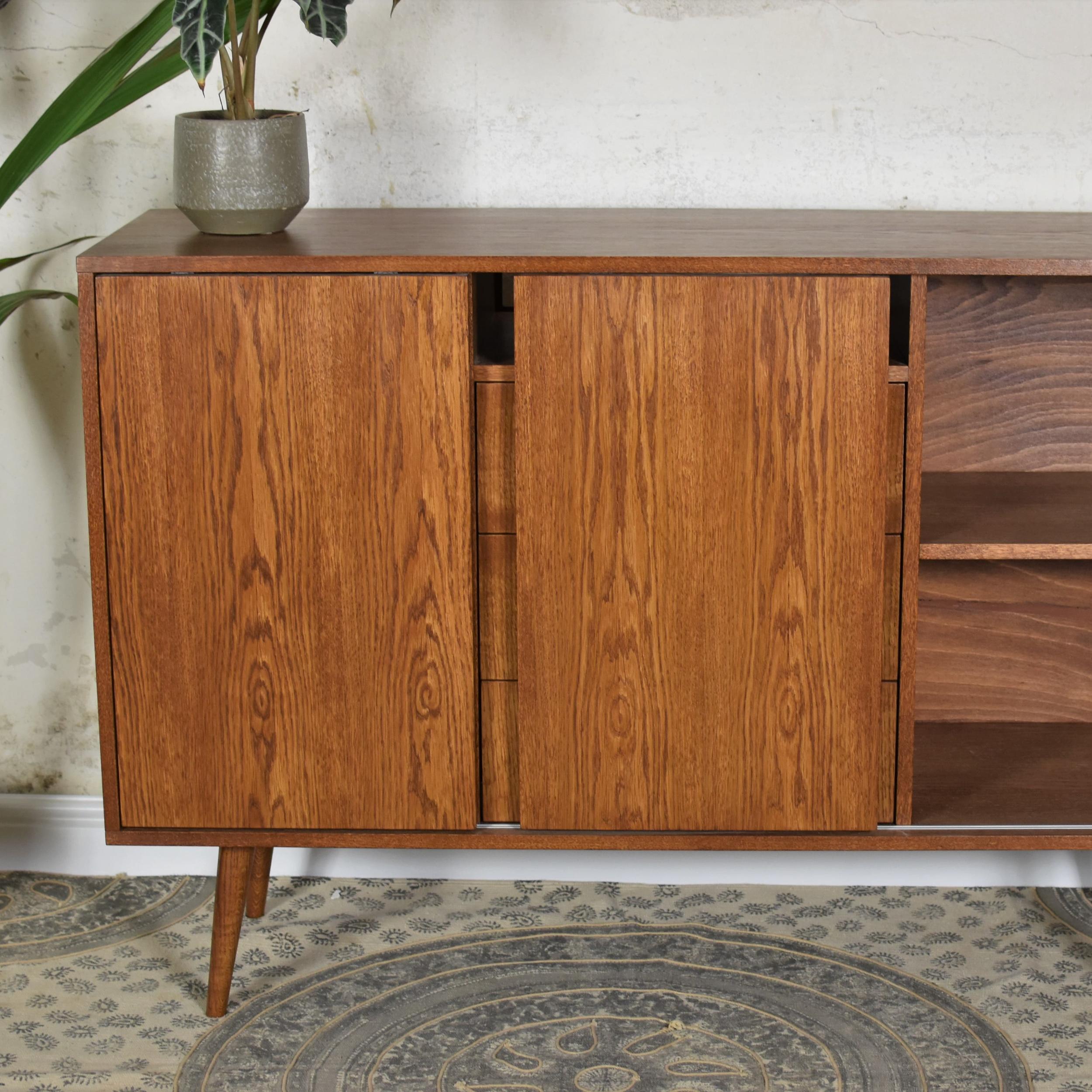 Classy + Sideboard by Pastform
Dimensions: D 46 x W 140 x H 95 cm.
Materials: Stained and varnished wood.

Available in different wood color finishes: Nobel, Rum, BPA, Whiskey, Natura, Brandy, and Schwarz. Please contact us.

Beautiful and