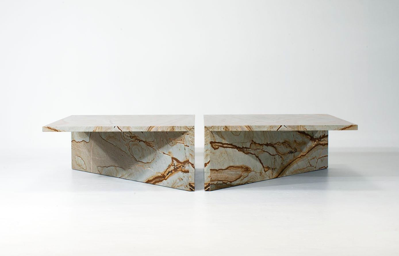 The visual impact of this table depends on how it is positioned as it can be perceived primarily as a large monolithic block or as an extreme cantilever that seems to defy possibility. When combining two tables together there are various