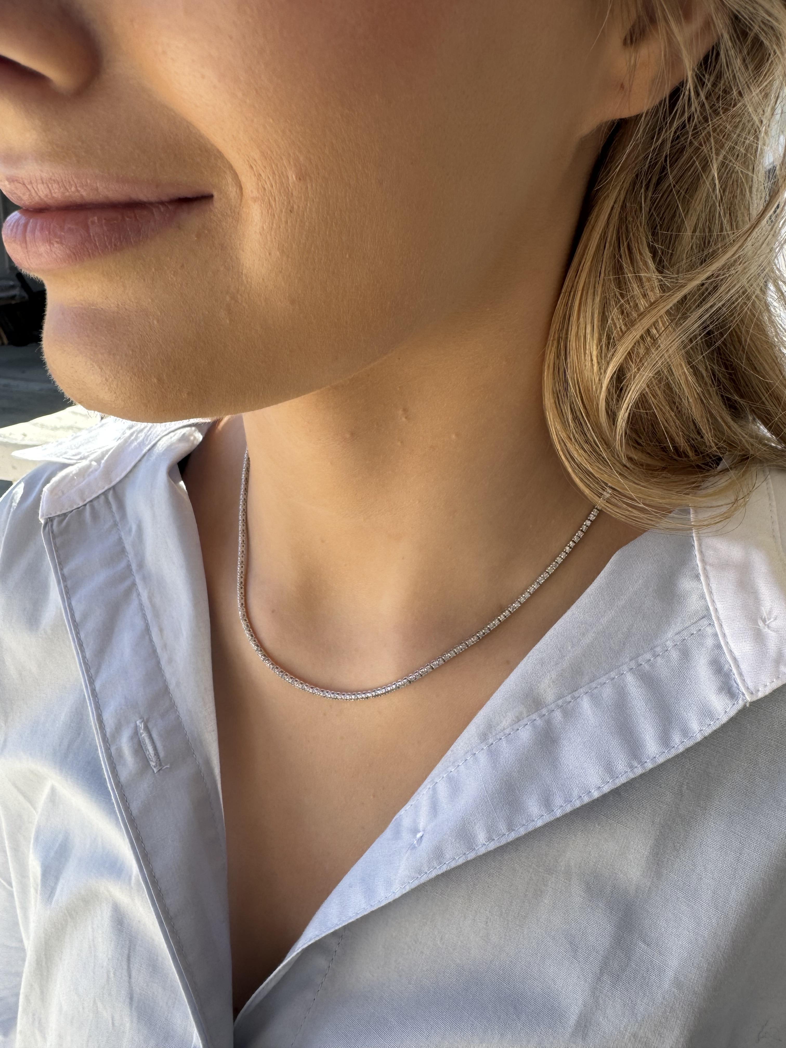 We love the classic look of these diamond tennis necklace!
Perfect for everyday love & wear.

Necklace Details
Material: 14K White Gold
Length: 16 Inches

Accented by the following gemstones
216 - 1.8mm Round Brilliant Cut Diamonds; HI Color; SI