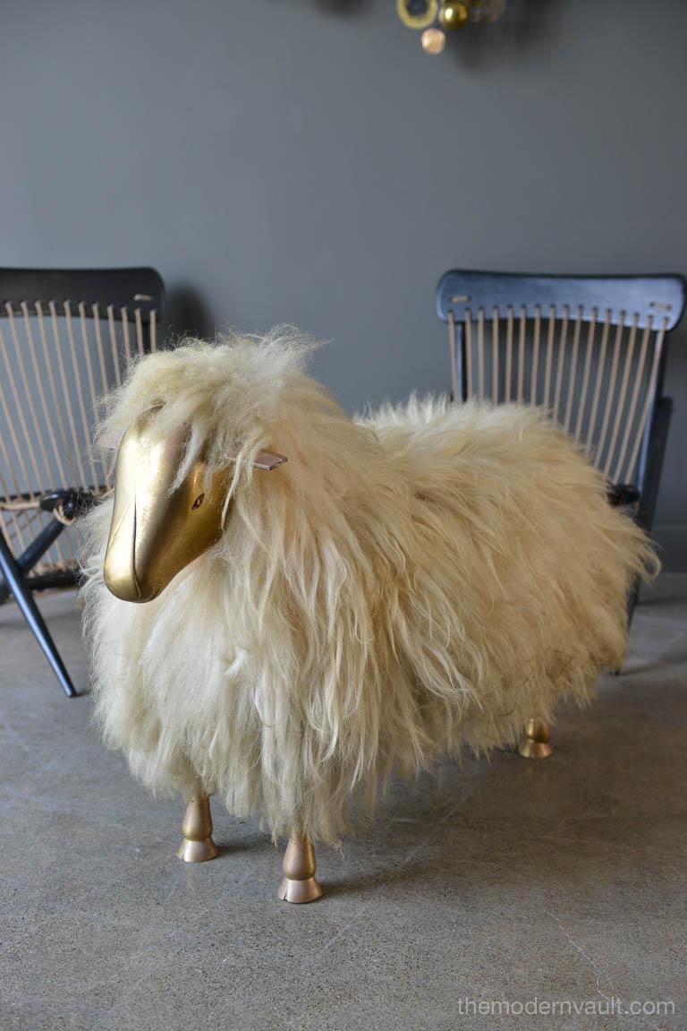 Claude and Francois-Xavier Lalanne style sheep ottoman or stool, circa 1970. Original brass face and legs, real fur and beautiful patina to the brass.
Measures: 34