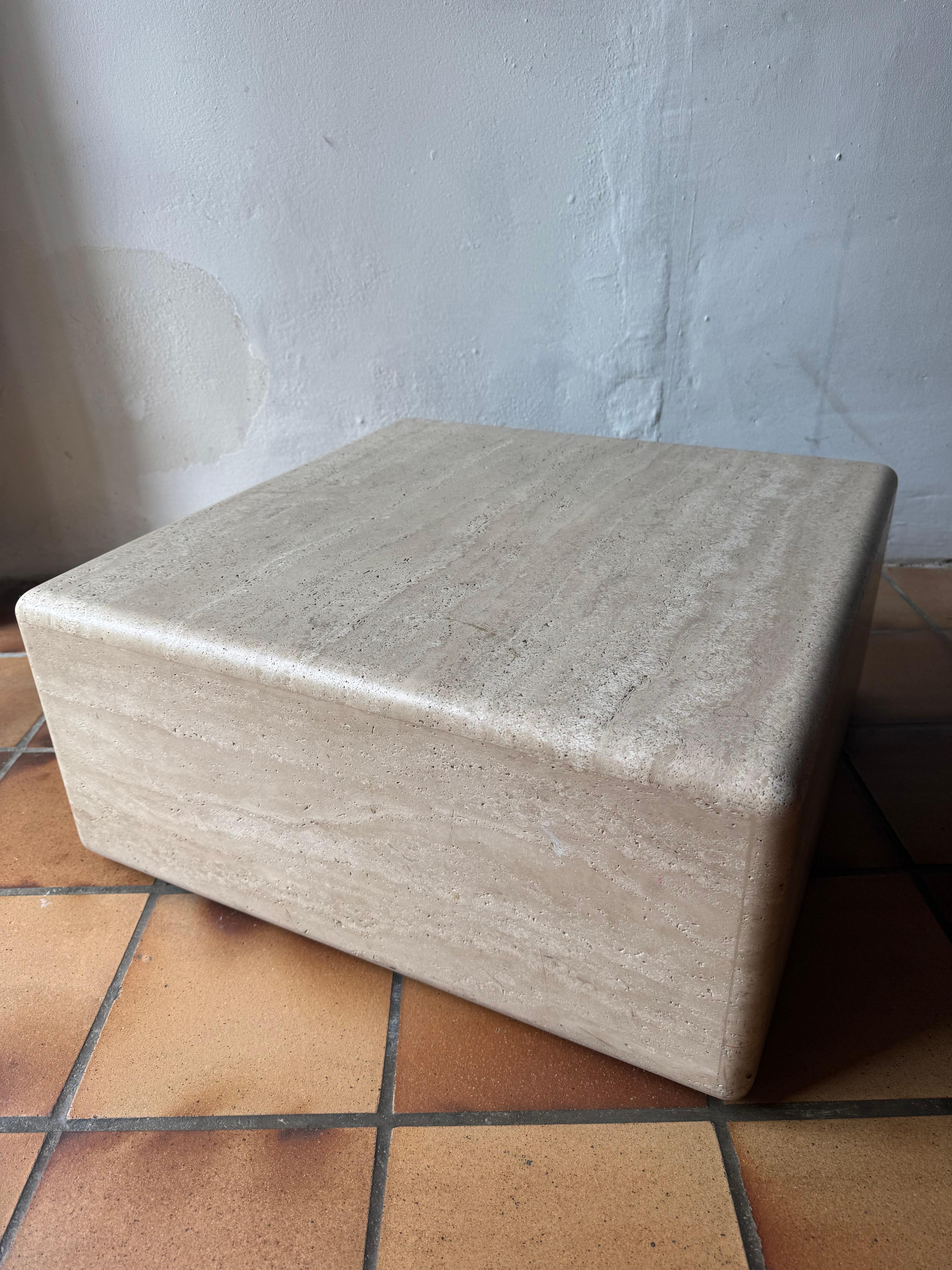 Polished Claude Berraldacci travertine coffee table For Sale