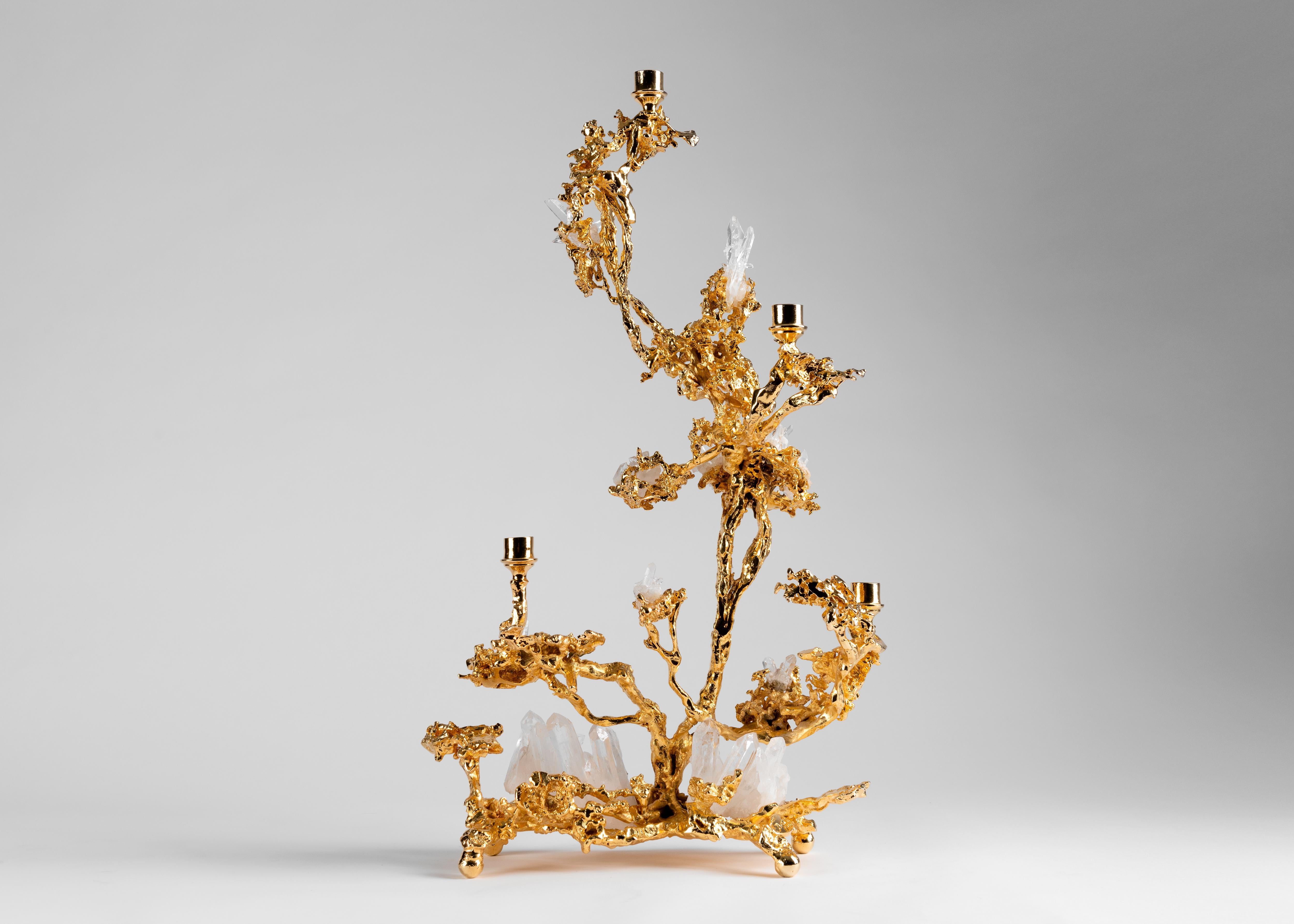 Claude Boeltz’s five branch candelabrum possesses the asymmetry of trickling water frozen in intense cold, a form further suggested by the quartz crystals set throughout. Yet, as with much of Boeltz's work, the piece is remarkable for the artist's