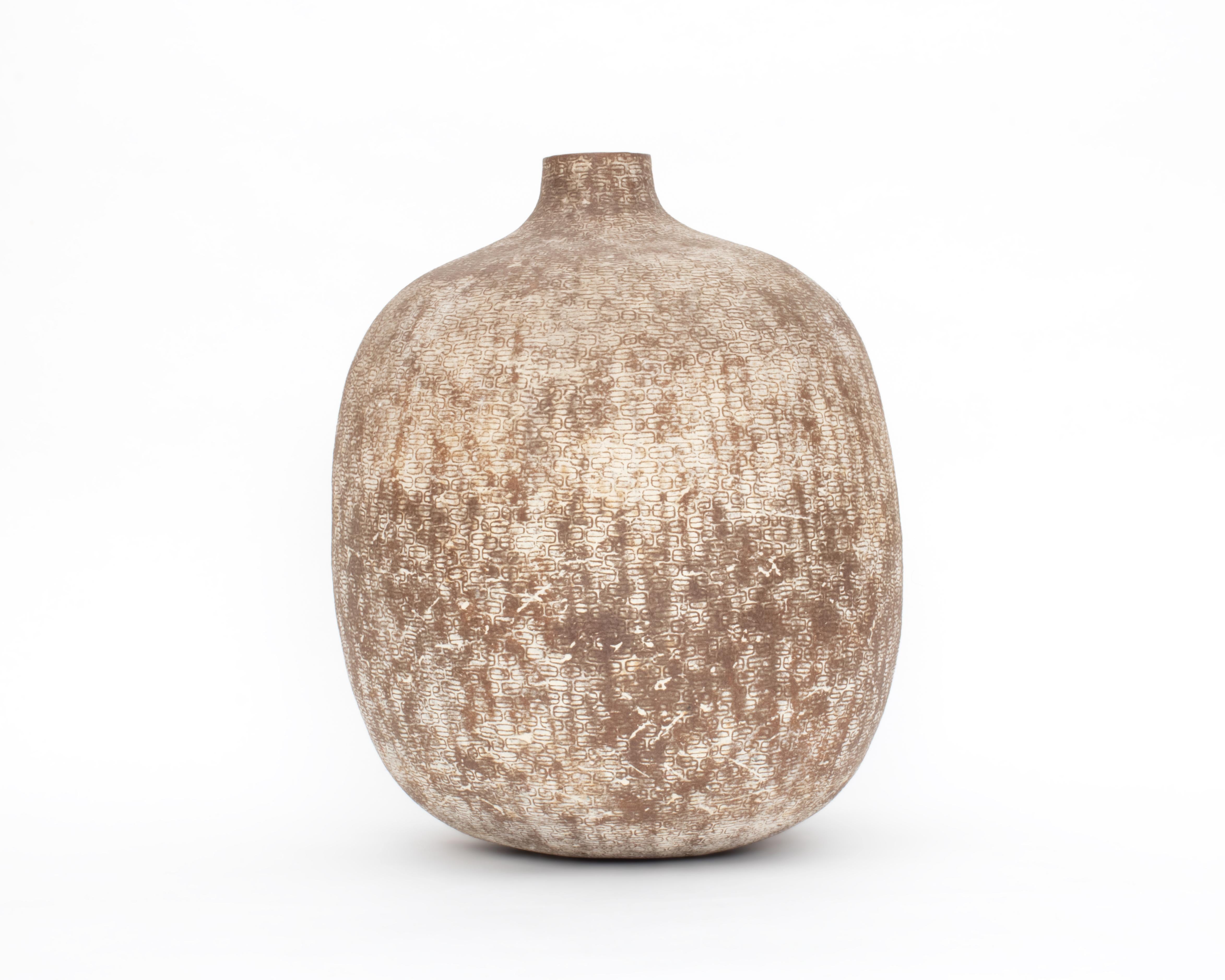 Here is a large stoneware vase by American artist, Claude Conover (1907 - 1994). It measures approximately 18