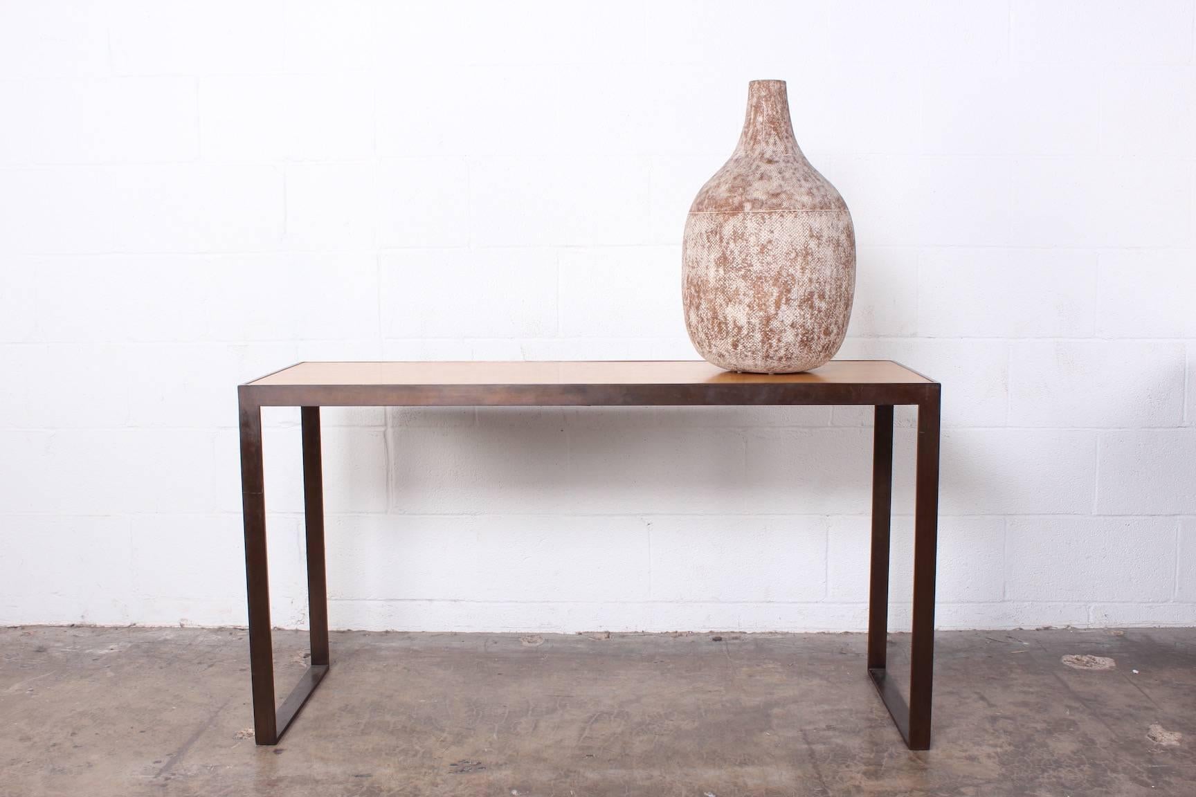 A large ceramic vase by Claude Conover titled 