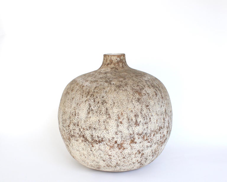 Claude Conover large ceramic vessel titled Suus. 
This stoneware vase is glazed in two different tones and finely decorated with Conover's signature and iconic markings.
Classic and contemporary in form, this bold and unique ceramic vessel has