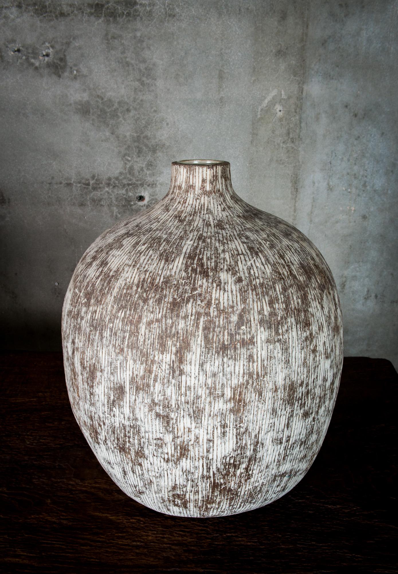 A ceramic vessel by Claude Conover, marked 