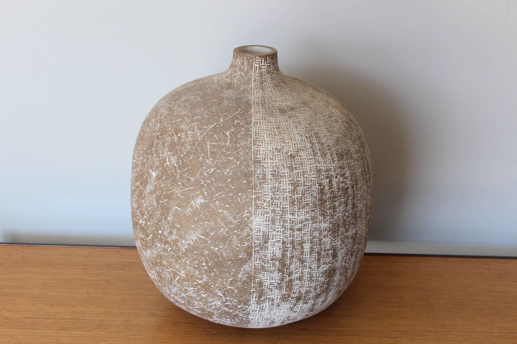 A large ceramic vase by Claude Conover titled 