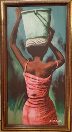 Lady Carrying A Bucket Of Water On Her Head