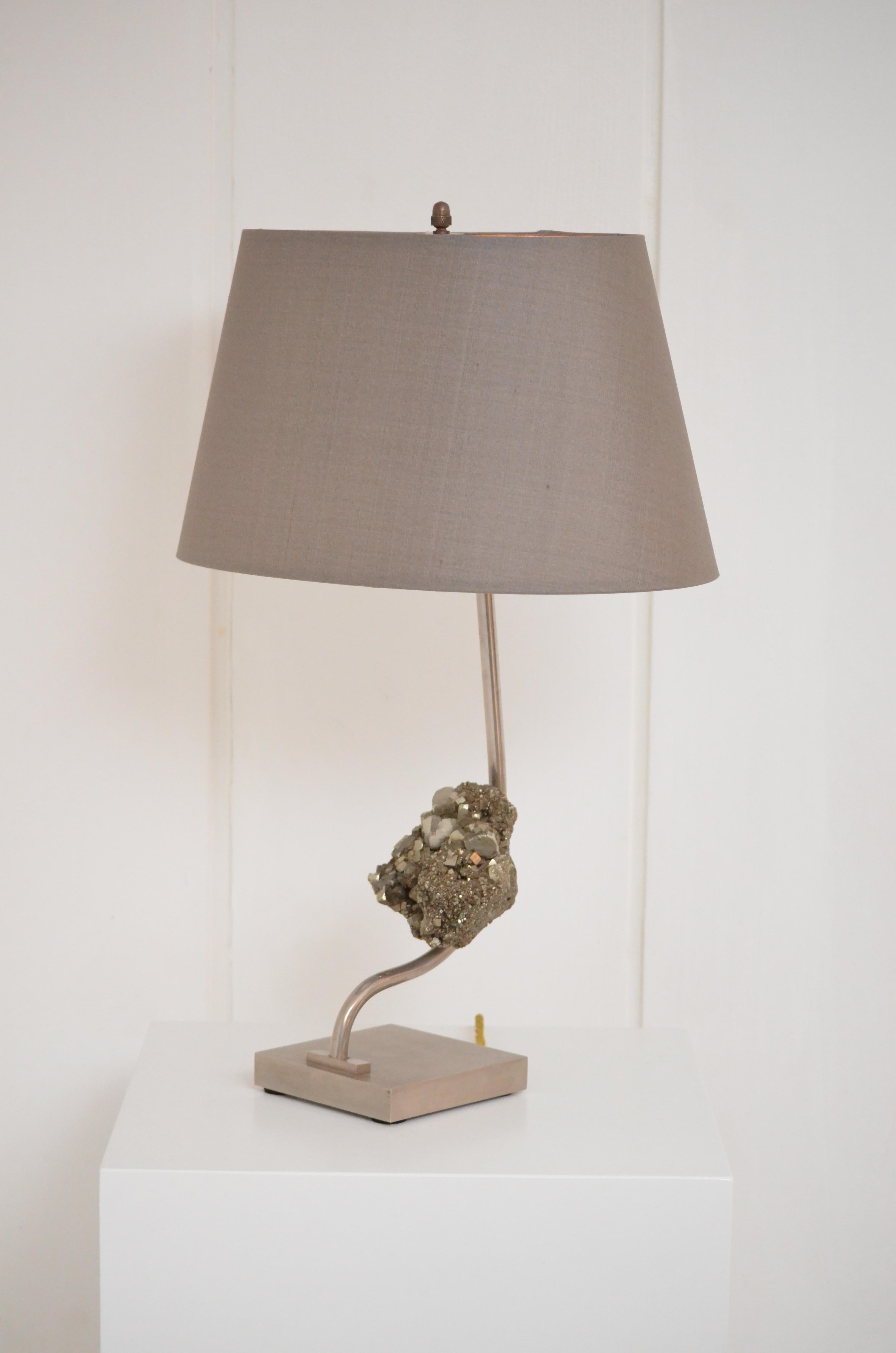 Claude De Muzac
Pyrite and steel lamp. Good vintage condition.
Italy. 1970
H. 53.5 cm W. 35 cm D. 25 cm