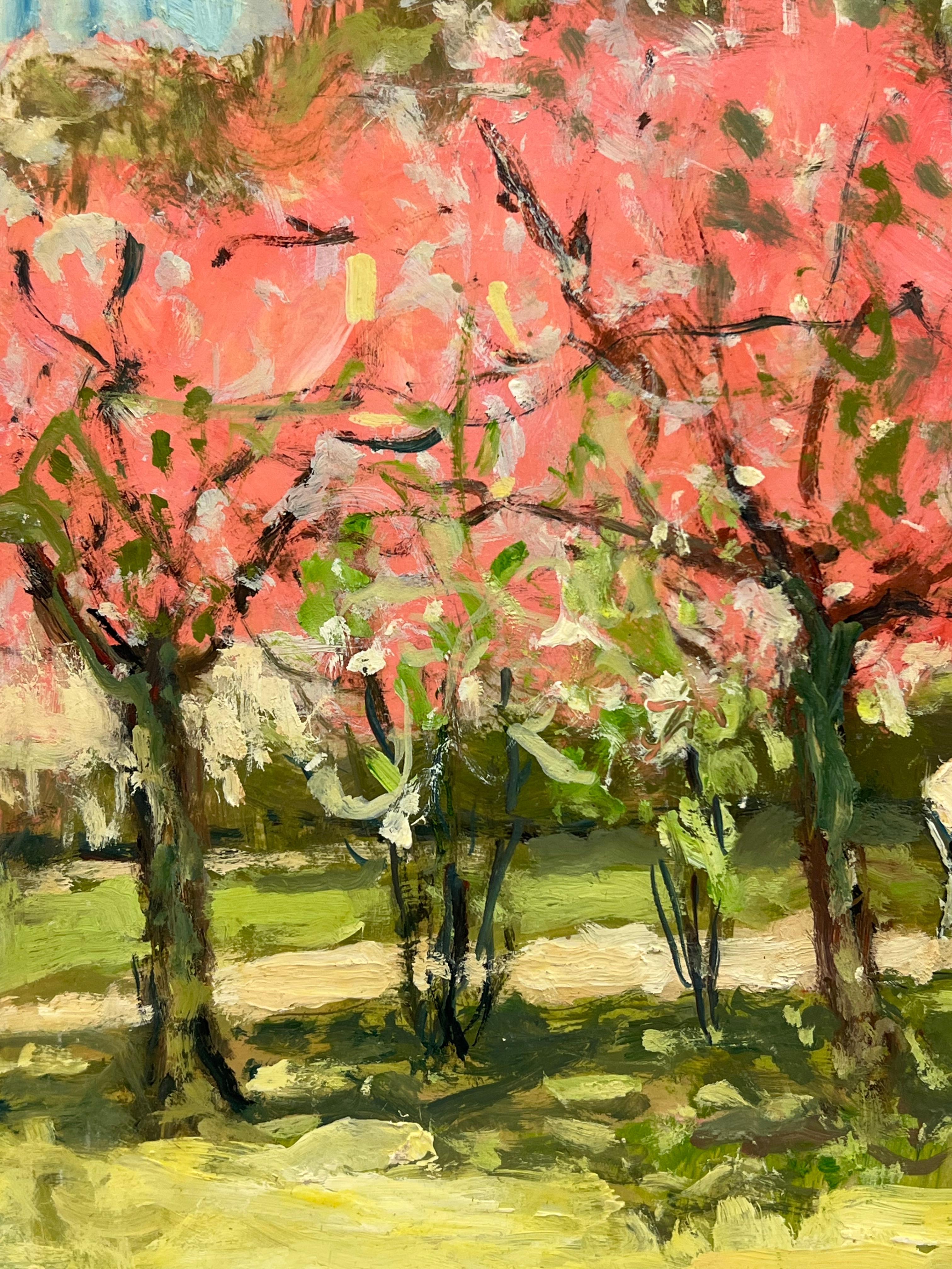Alberi di fiori rosa Parco parigino Figura che legge Olio impressionista francese del 1980 - Painting Impressionismo di Claude Marin