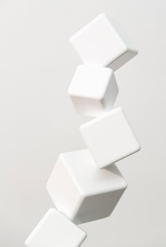10 Cubes Blancs à la Seconde (10 White Cubes Per Second) - steel sculpture
