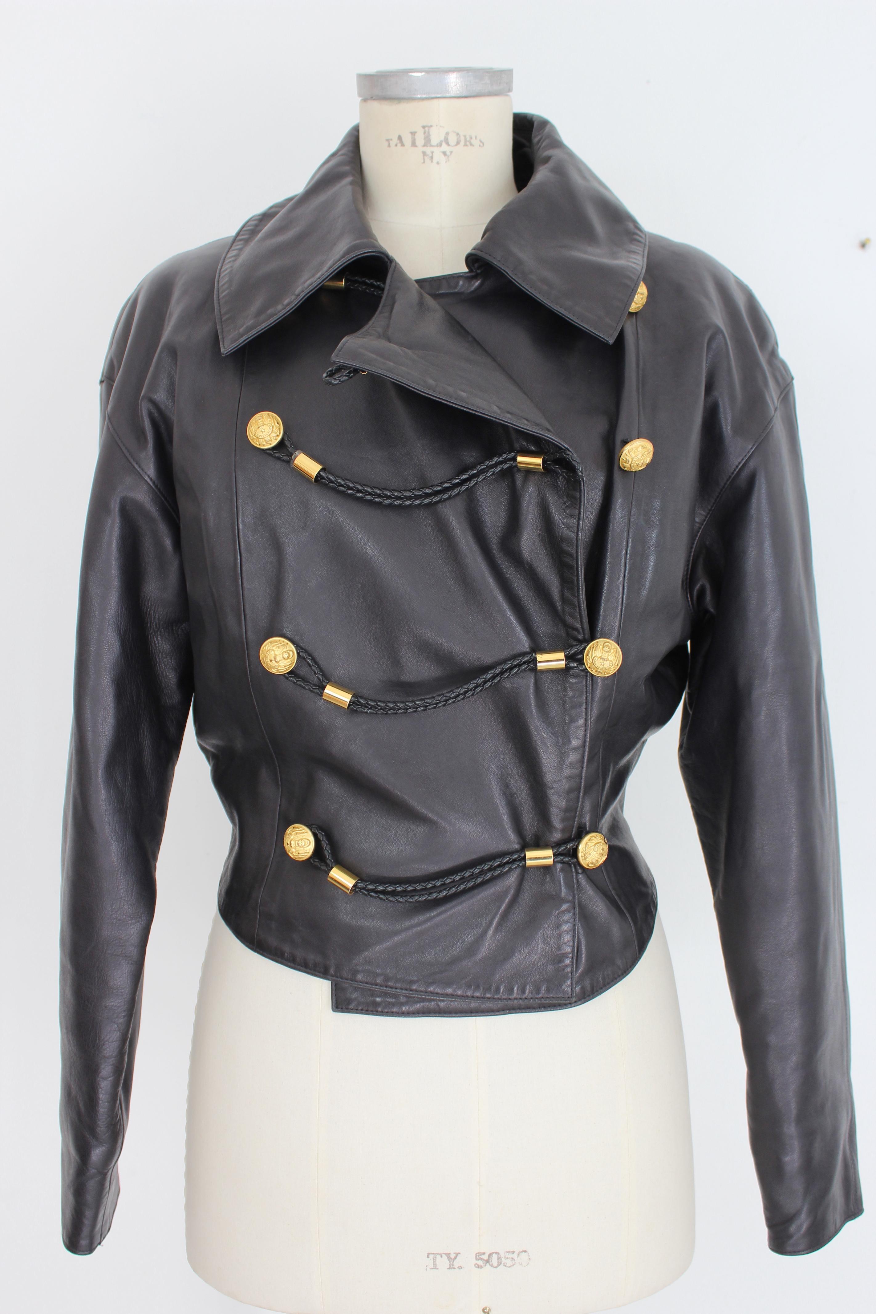 Claude Montana vintage 90s leather biker jacket. Double-breasted jacket, short at the waist in soft leather. Round shoulders with wide sleeves. Black color with gold colored buttons. Made in France.

Condition: Excellent

Item used few times, it