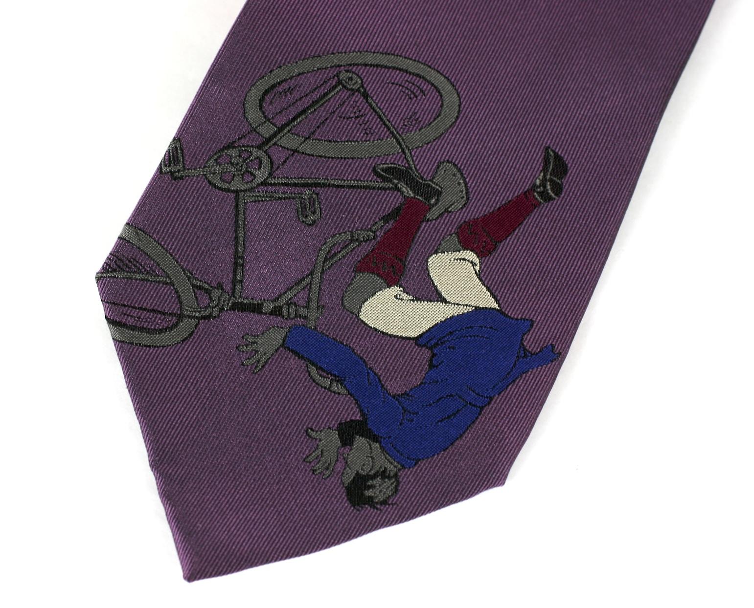 Claude Montana Bold Novelty Tie of unusual purple silk twill with woven motif of Deco style cartoon rider tumbling off. Really charming and subtle until you see the woven motif on end. Perfect foil for the large shoulder suits of the