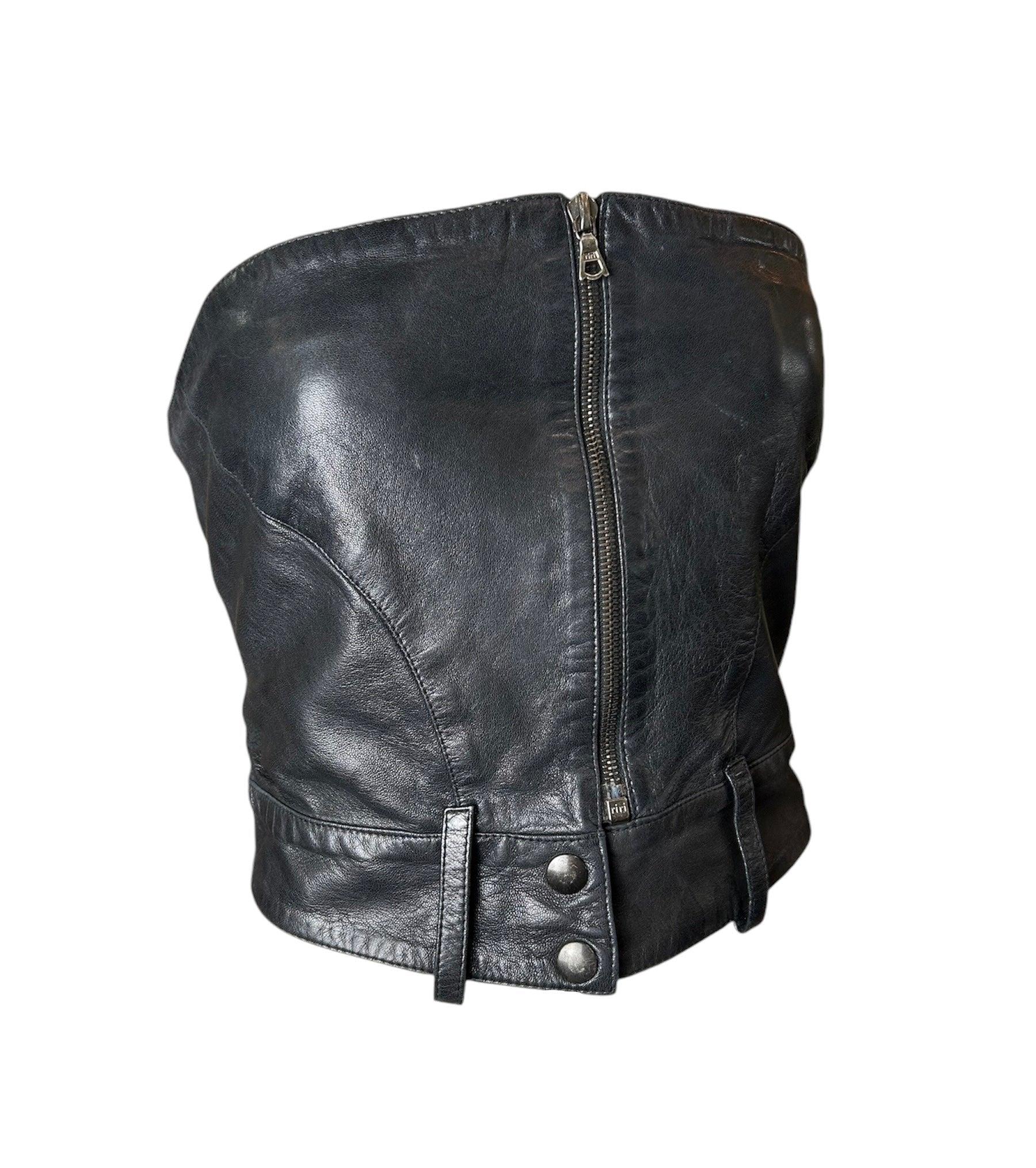 This luxurious lambskin leather bustier is from Claude Montana's era designing for Idéal-Cuir. Biker chic, leather momma or cat woman, you'll whip an audience into place with this stand-alone wonder. Button snaps show scuffing which actually adds to