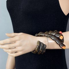CLAUDE MONTANA Pour Claire DEVE Skulpturale, konische, abgestufte Claw Manschette Armband
