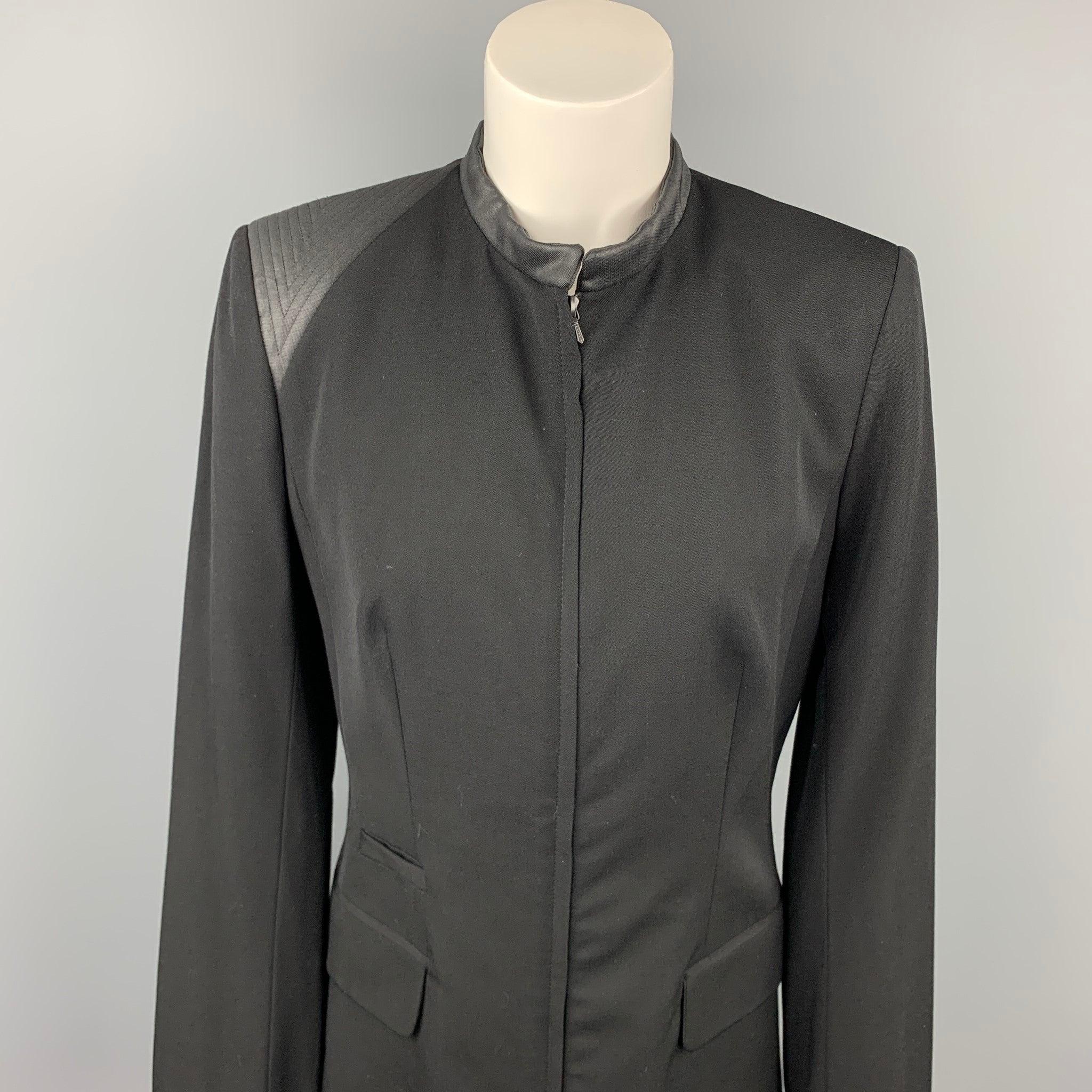 CLAUDE MONTANA jacket comes in a black two toned wool / silk featuring a ribbed hem, shoulder pads, flap pockets, and a zip up closure. Made in Italy.Very Good
Pre-Owned Condition. 

Marked:   IT 40 

Measurements: 
 
Shoulder: 15.5 inches 
Bust: 35