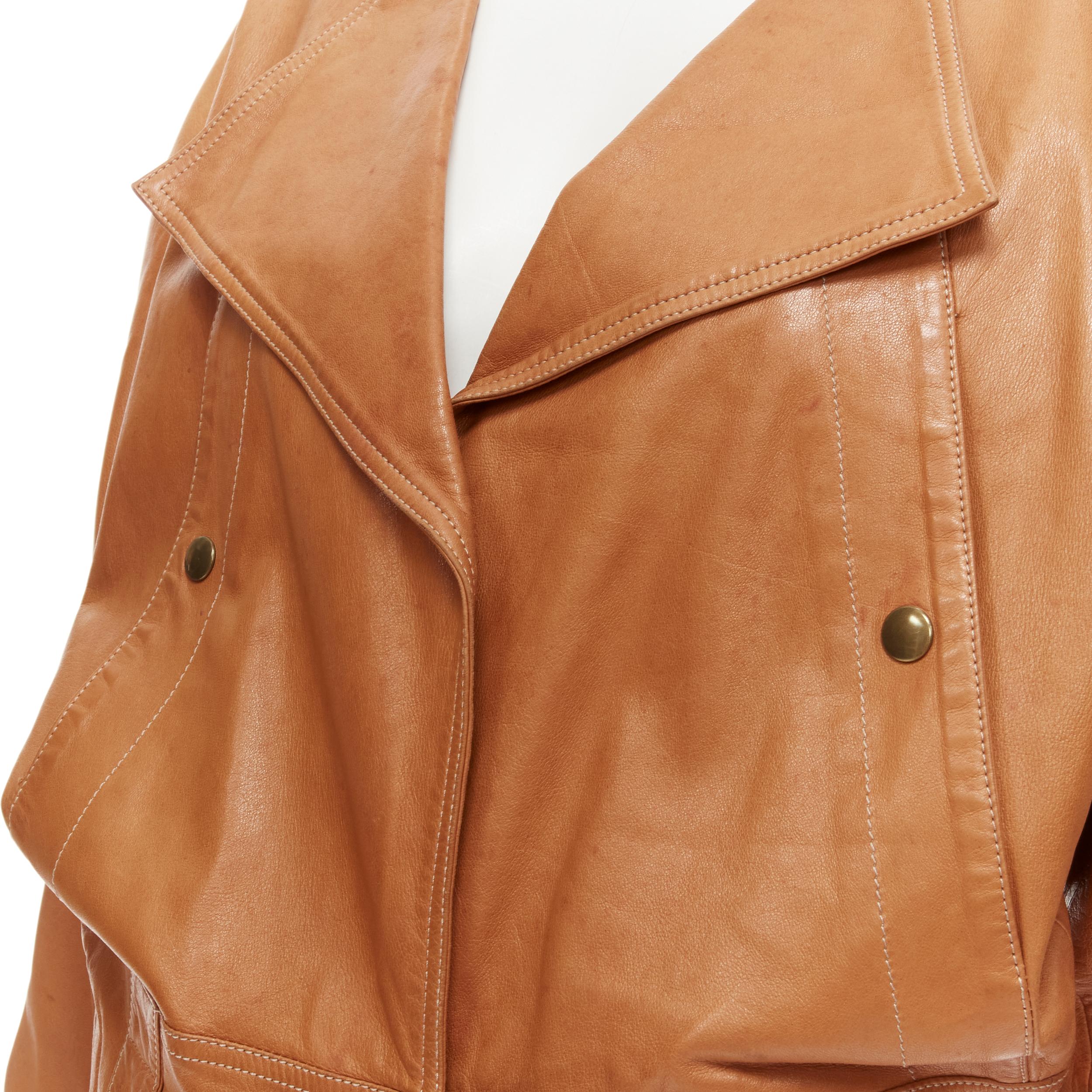 CLAUDE MONTANA Vintage brown leather dolman sleeve biker jacket IT38 XS 
Reference: TGAS/C00146 
Brand: Claude Montana 
Material: Leather 
Color: Brown 
Pattern: Solid 
Closure: Button Extra 
Detail: Spread collar. Snap button pockets. Snap button
