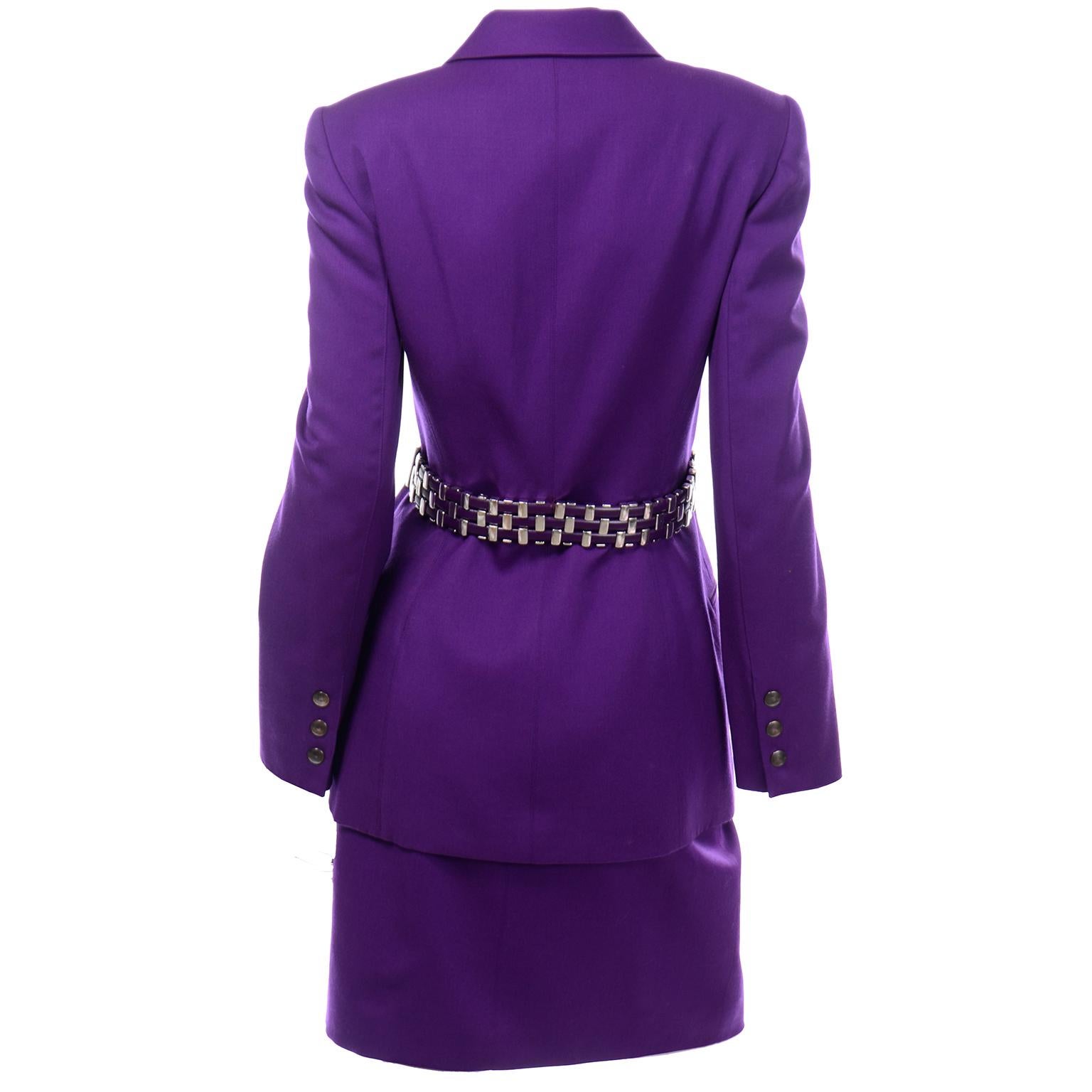 This is a fabulous Claude Montana vintage 1990's purple wool skirt suit with silver hardware & leather back belt attached to the jacket. You can wear this outfit as a suit or break up the set for 2 great separates! This incredible suit has a