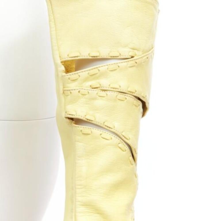 White CLAUDE MONTANA Vintage yellow leather topstitch cut out gloves US7 For Sale