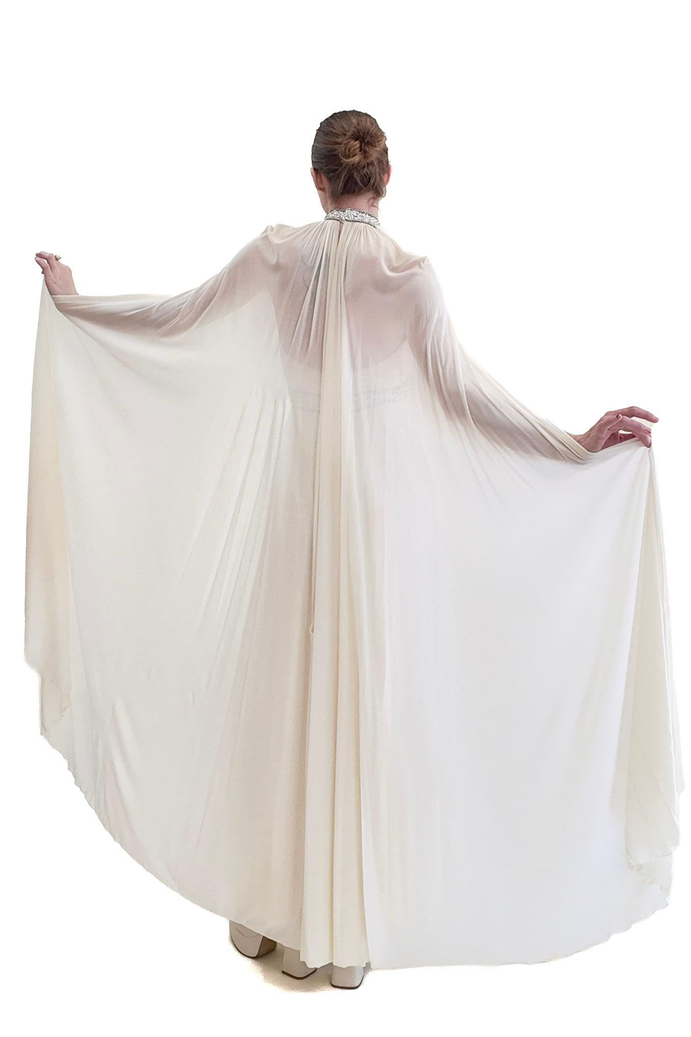 Donna Claude Riha White Caped Gown with Beaded Neckline and Waistline in vendita