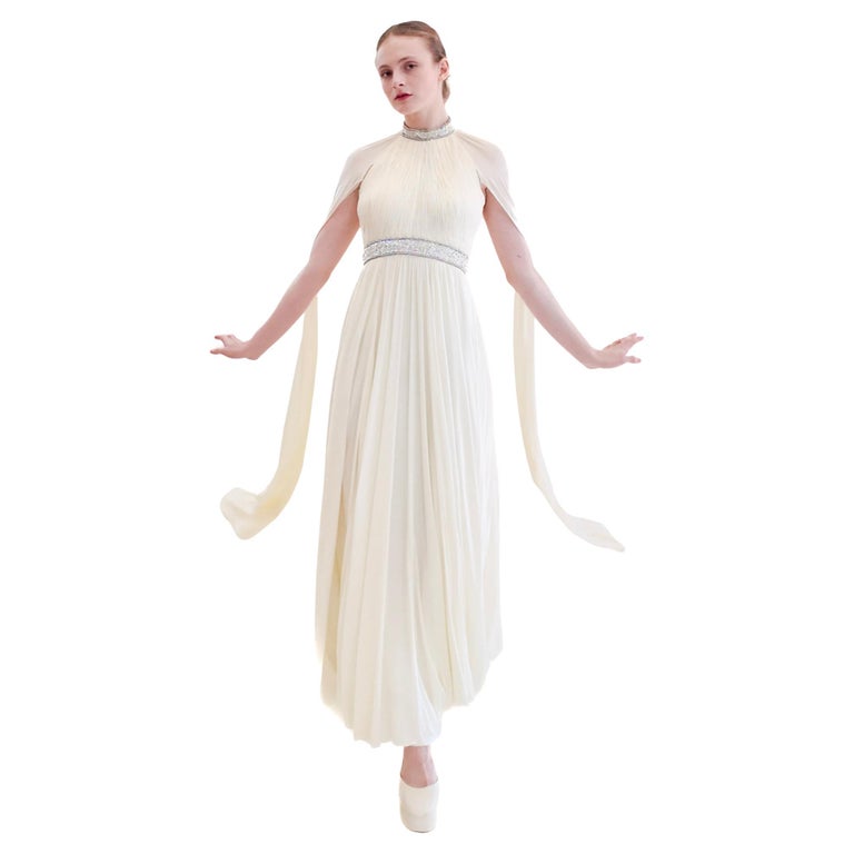 Claude Riha White Caped Gown With Beaded Neckline And Waistline