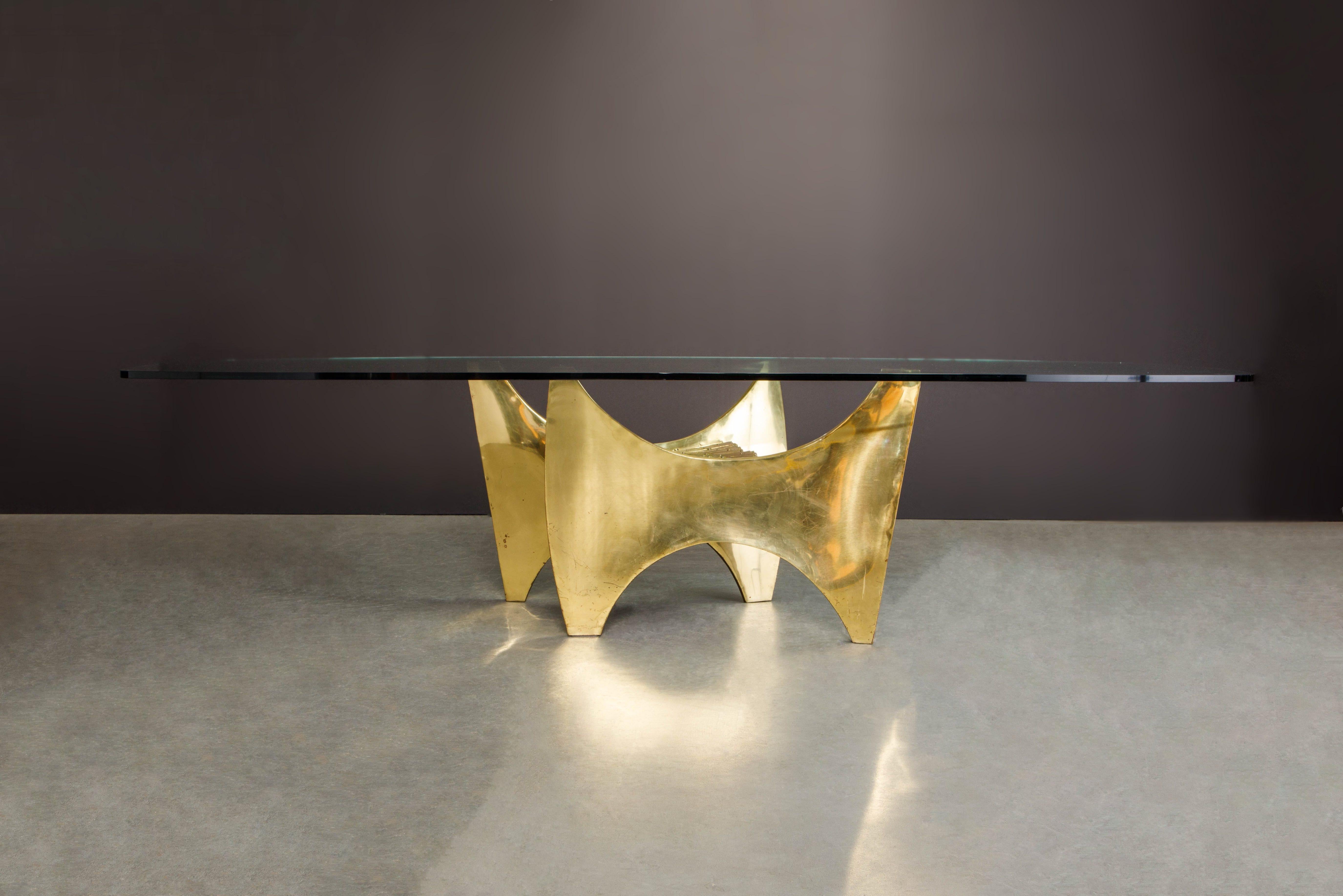 An extremely rare and coveted fine art sculpture which doubles as a dining table or conference table by French artist sculptor Claude Santarelli, signed 'SANTA' on the base as can be seen in the photo gallery of this listing.  This amazing sculpture