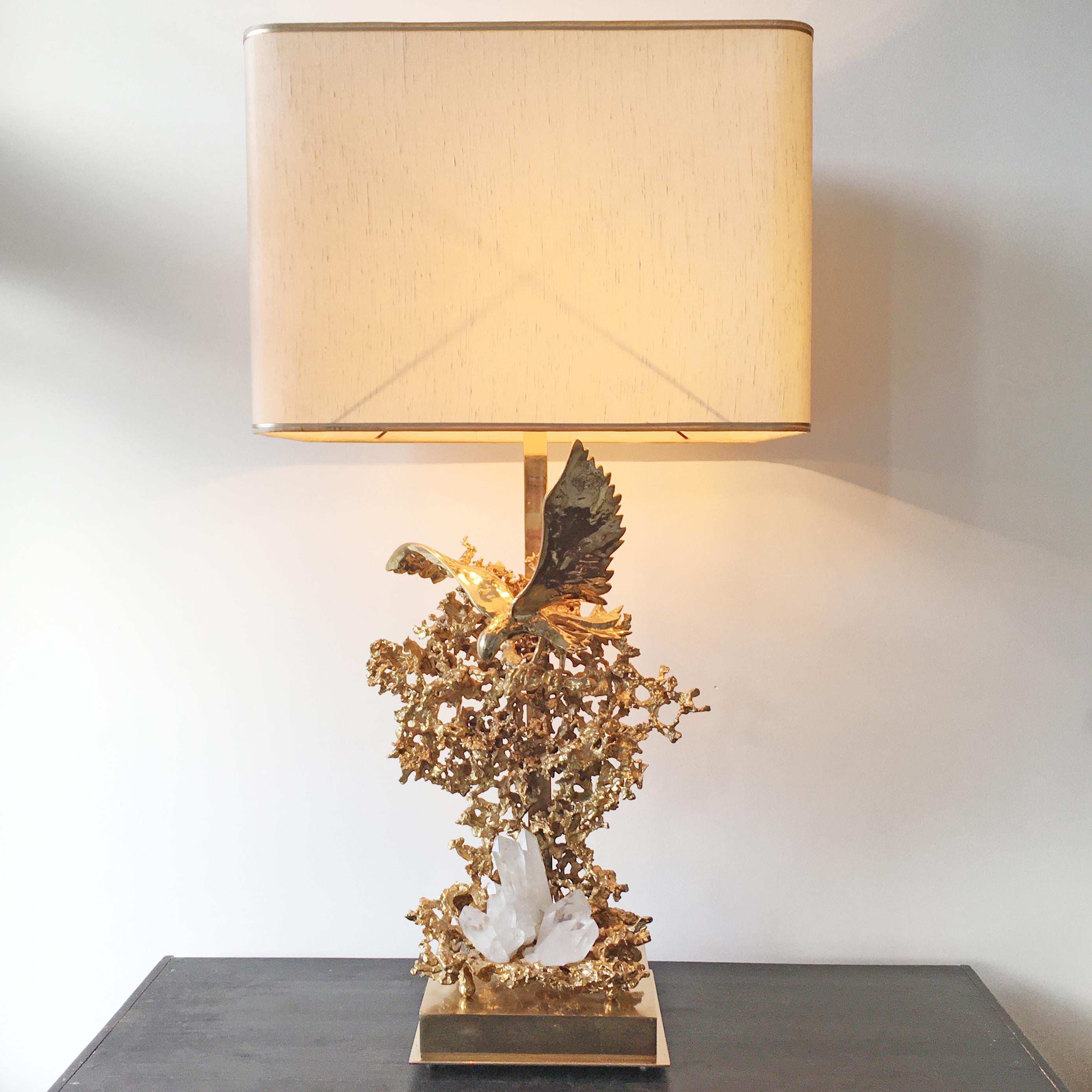 Claude Victor Boeltz sculptural 24-karat gold plated 'exploded' table lamp with eagle and rock crystal inclusions
An incredible statement piece
The natural rock quartz crystal wands are set into the base
France circa 1970
The lamp has 3 bulb