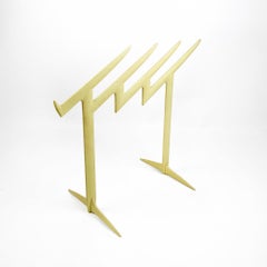 Claudia Evangelista magazine rack, designed by Philippe Starck for Kartell 1996