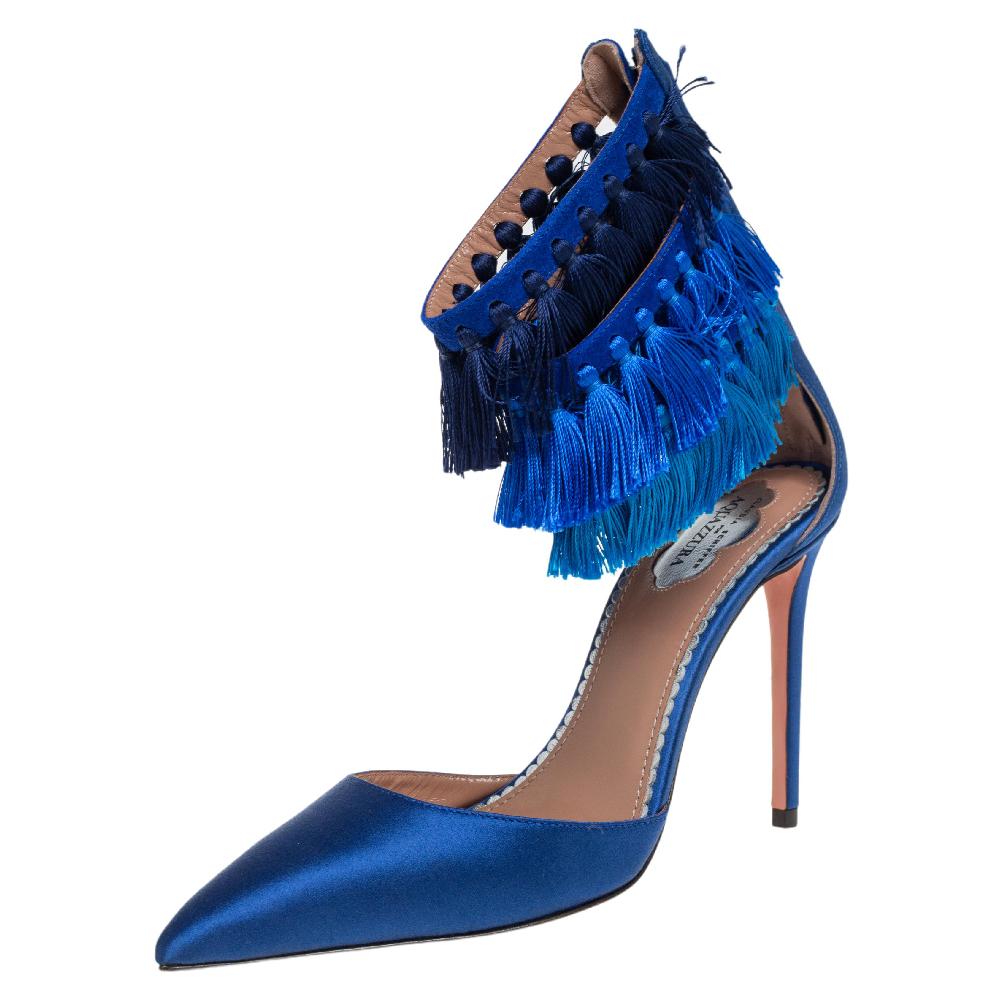 Nothing like a posh pair of pumps to grab the spotlight! These Aquazzura pumps by Claudia Schiffer are made from satin and suede with insoles lined in leather. They've been styled with pointed toes and fringes on the ankles. Complete with 10 cm