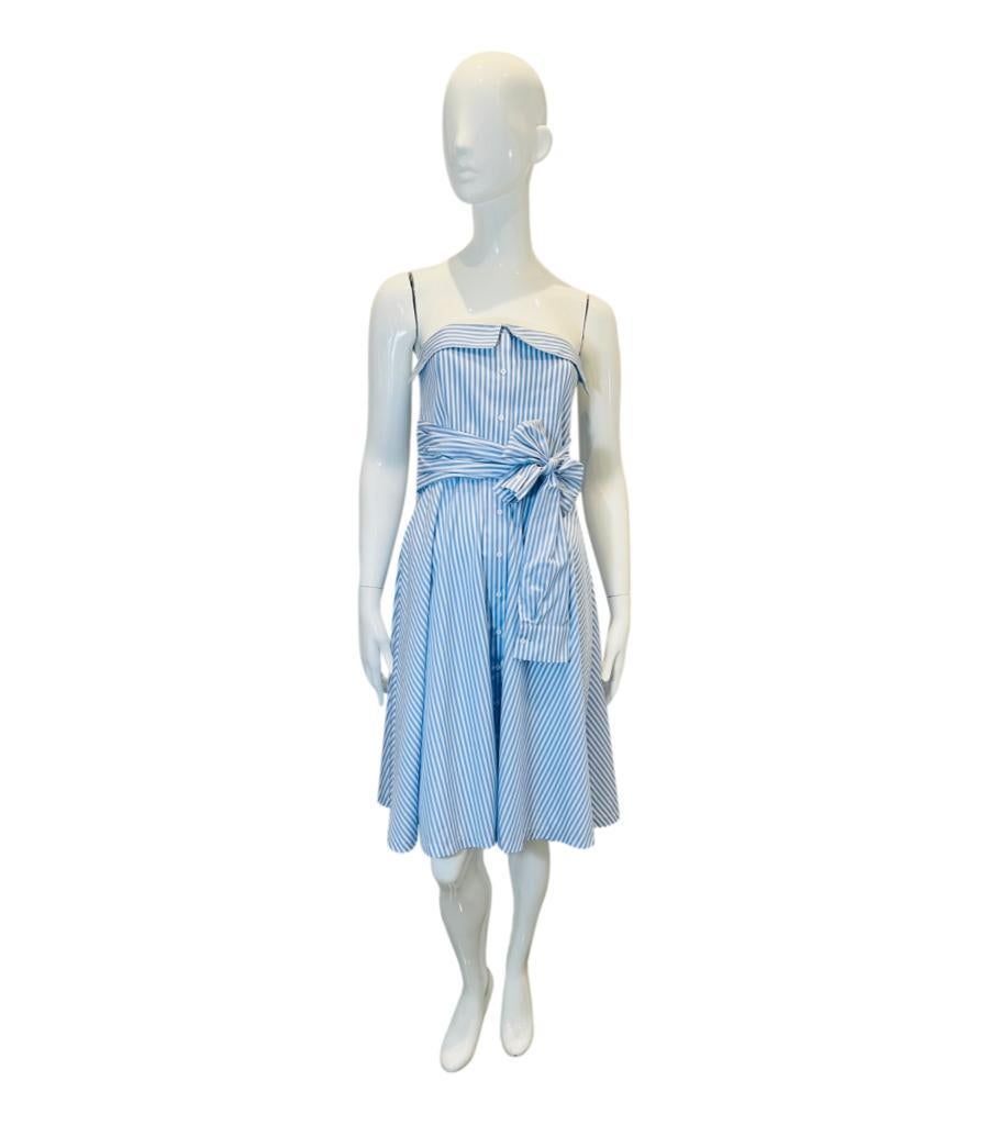 Claudie Pierlot Corseted Sleeveless Cotton Dress
Light blue knee-length 'Rina' dress crafted in cotton-poplin banker stripes.
Sleeves and collar reworked from a classic shirt to create overlay detail to the neckline and tie-up belt at