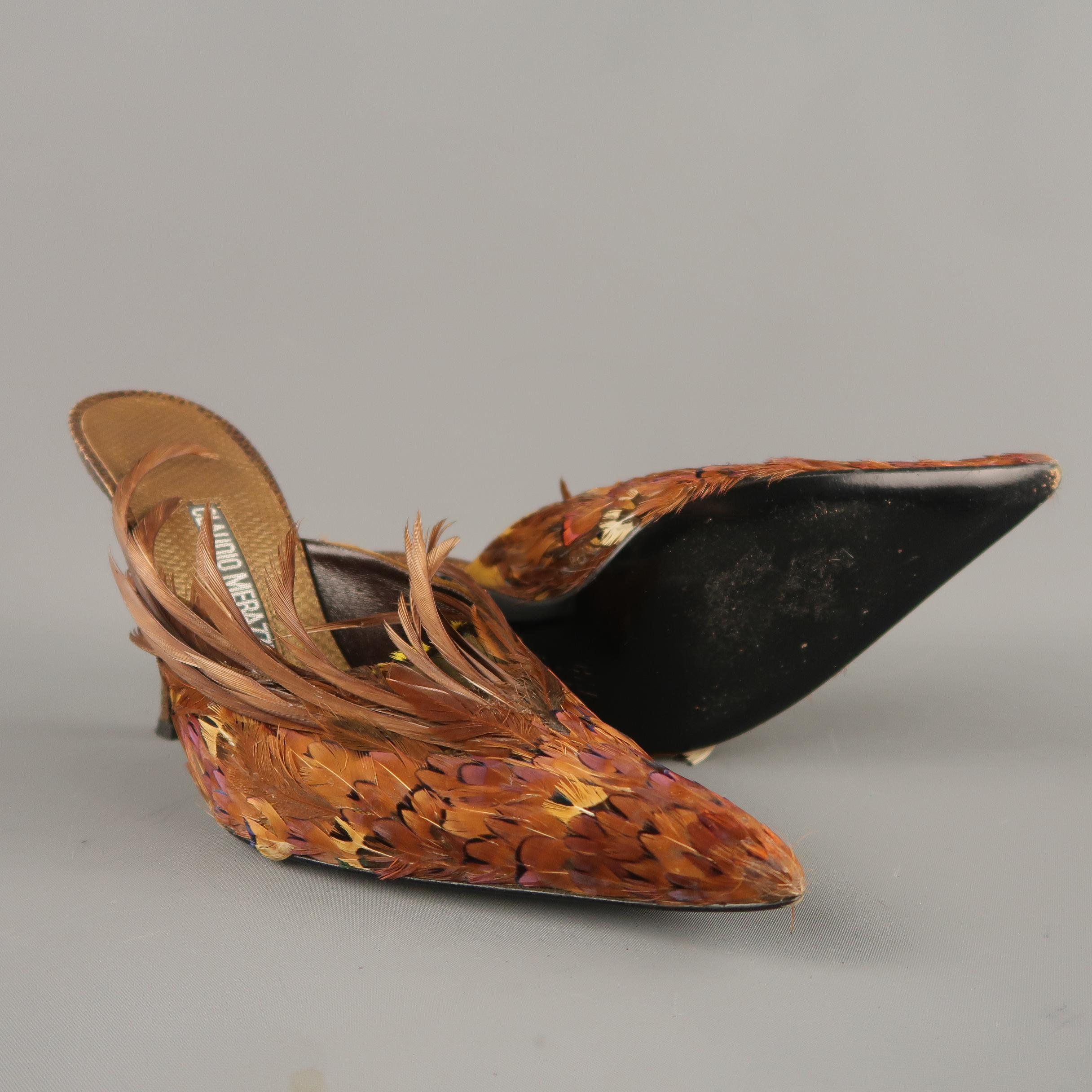 CLAUDIO MERAZZI mules come in brown textured leather with a covered stiletto heel and pointed toe front embellished with pheasant feathers. Made in Italy.
 
Excellent Pre-Owned Condition.
Marked: IT 40
 
Measurements:
 
Heel: 4.75 in.