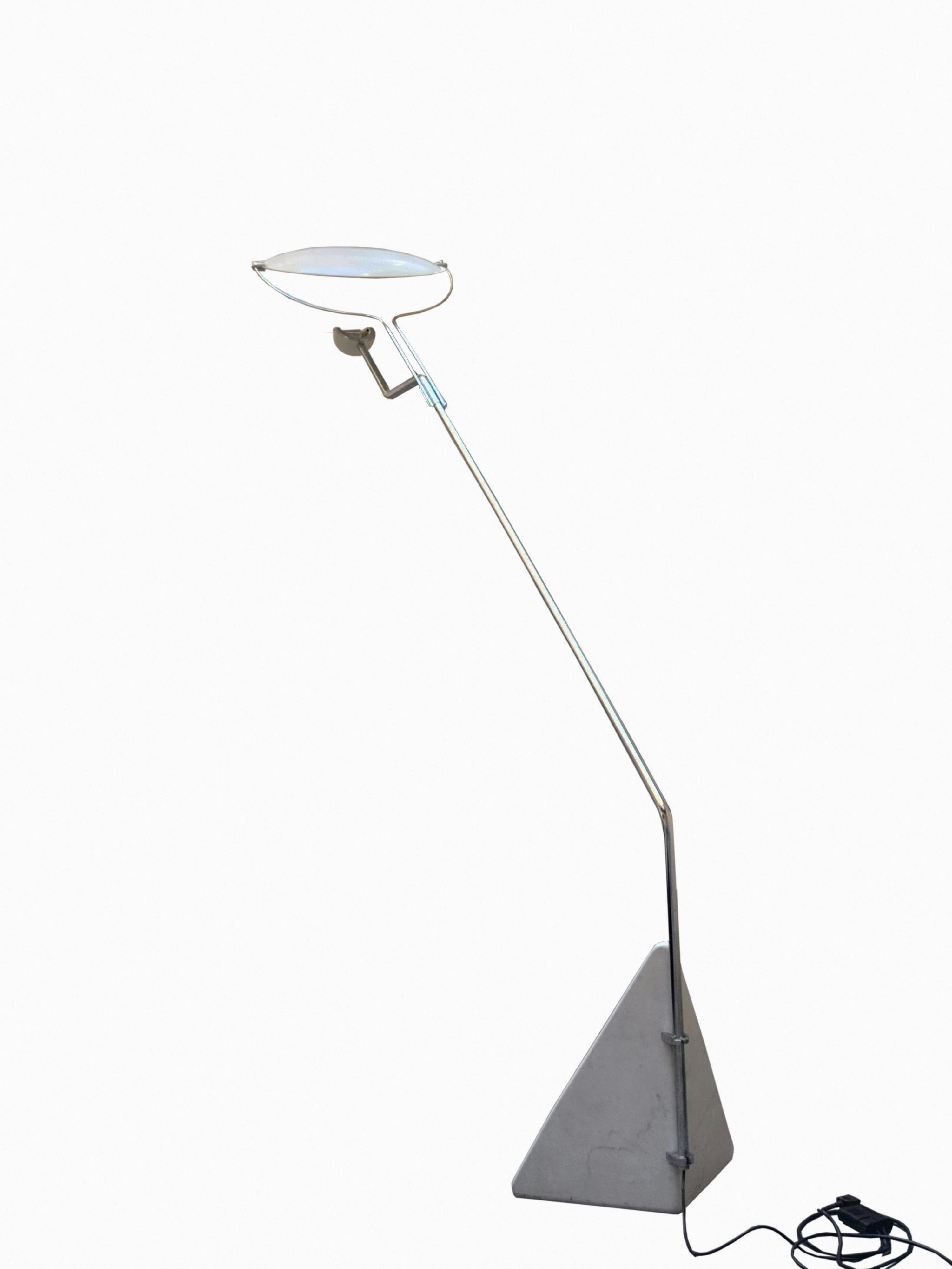 Claudio Salocchi for Skipper, 'Riflessione' floor lamp, marble, chromed steel, enameled aluminum, Italy, ca. 1973.
This extraordinary floor lamp has a chrome-plated steel frame, enameled aluminum shade, and triangular marble base. The direction of