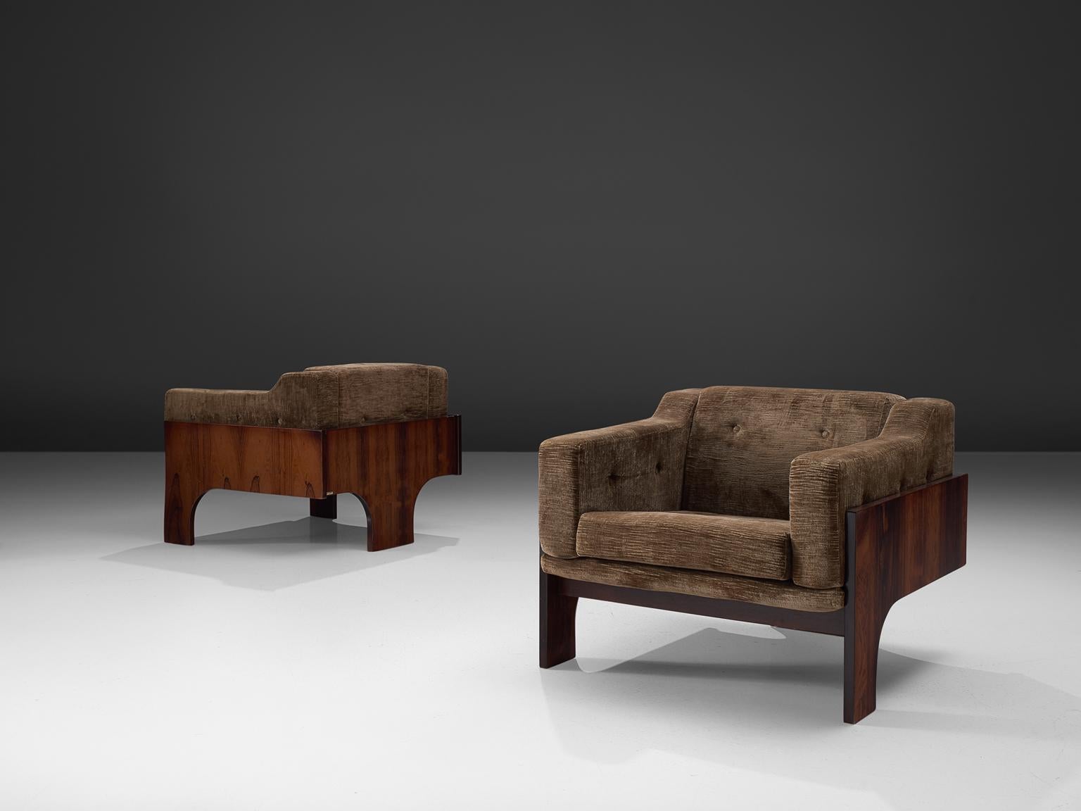 Claudio Salocchi for Sormani, set of 2 'Oriolo' lounge chairs, rosewood and fabric Italy, 1966

The ‘T-shaped wooden frame’ holds an elegant leather detail on the back of each chair. The armchair features a tripod, T-shaped frame made of rosewood.