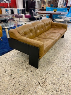 Erik De Forse ,  Sofa in lacquered wood and leather circa 1960