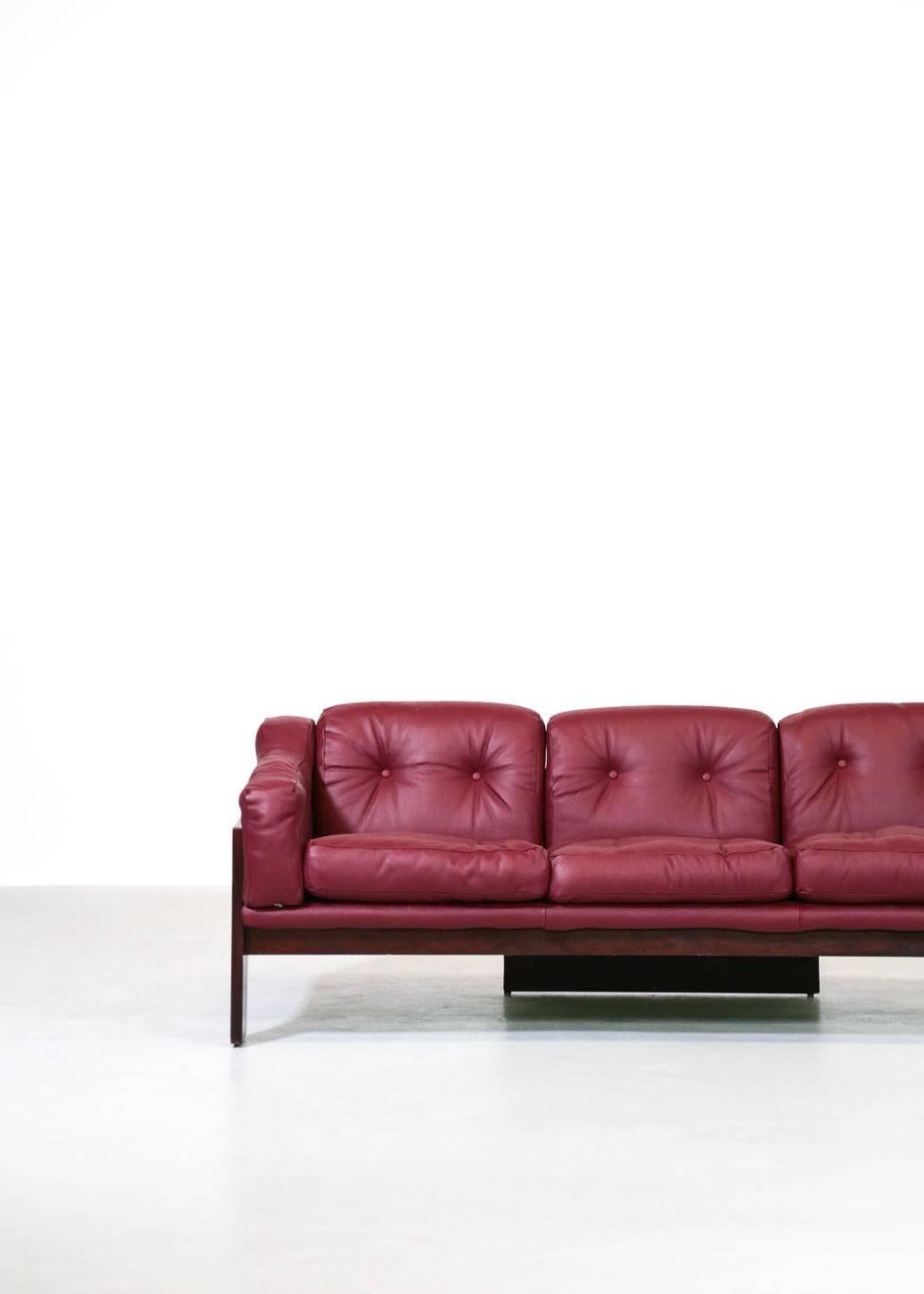 Oriolo sofa designed by Claudio Salocchi for Sormani.
Made in Italy, 1966.
Structure in rosewood, seat in leather.

 