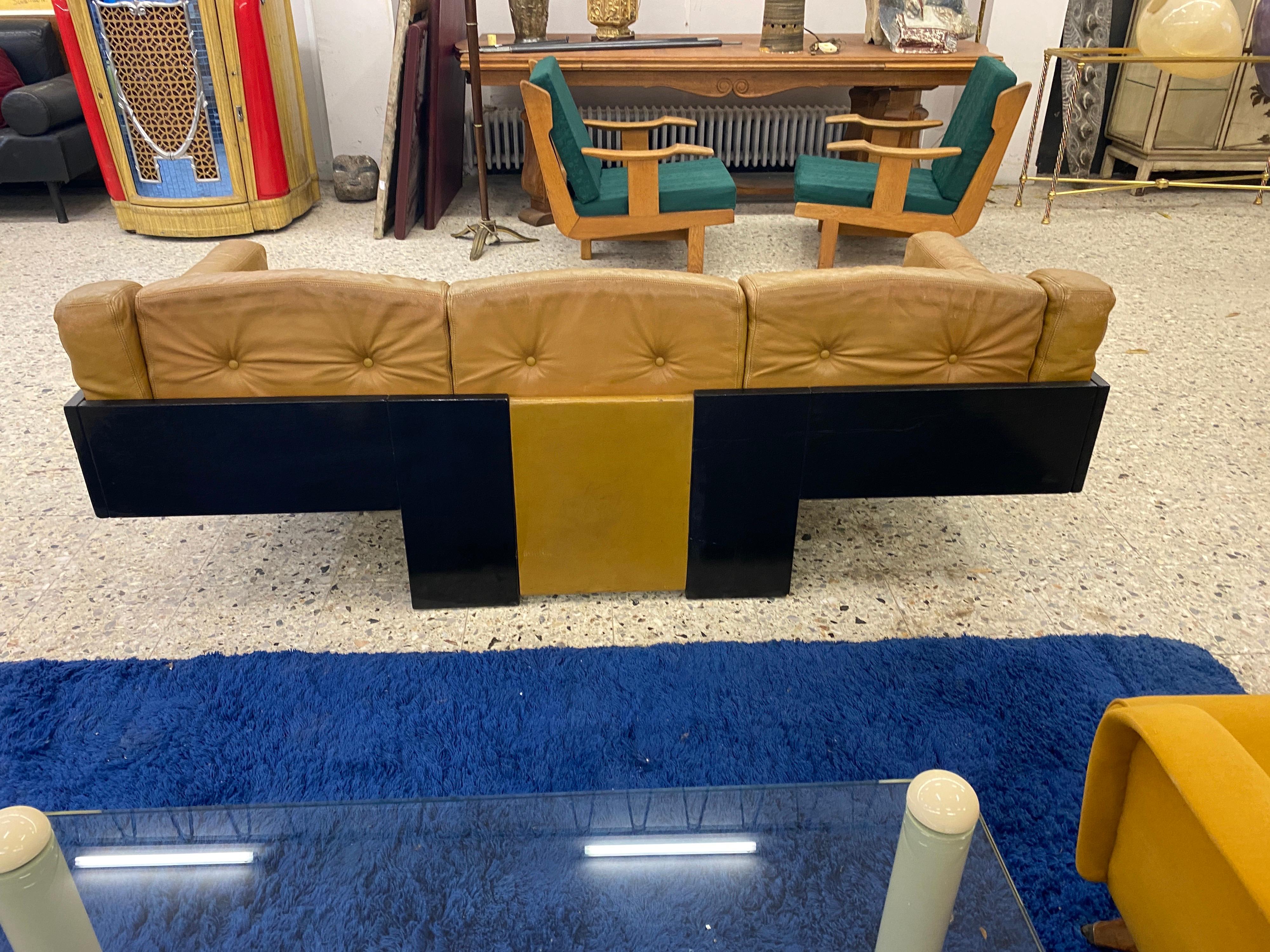 Lacquered Erik De Forse ,  Sofa in lacquered wood and leather circa 1960 For Sale