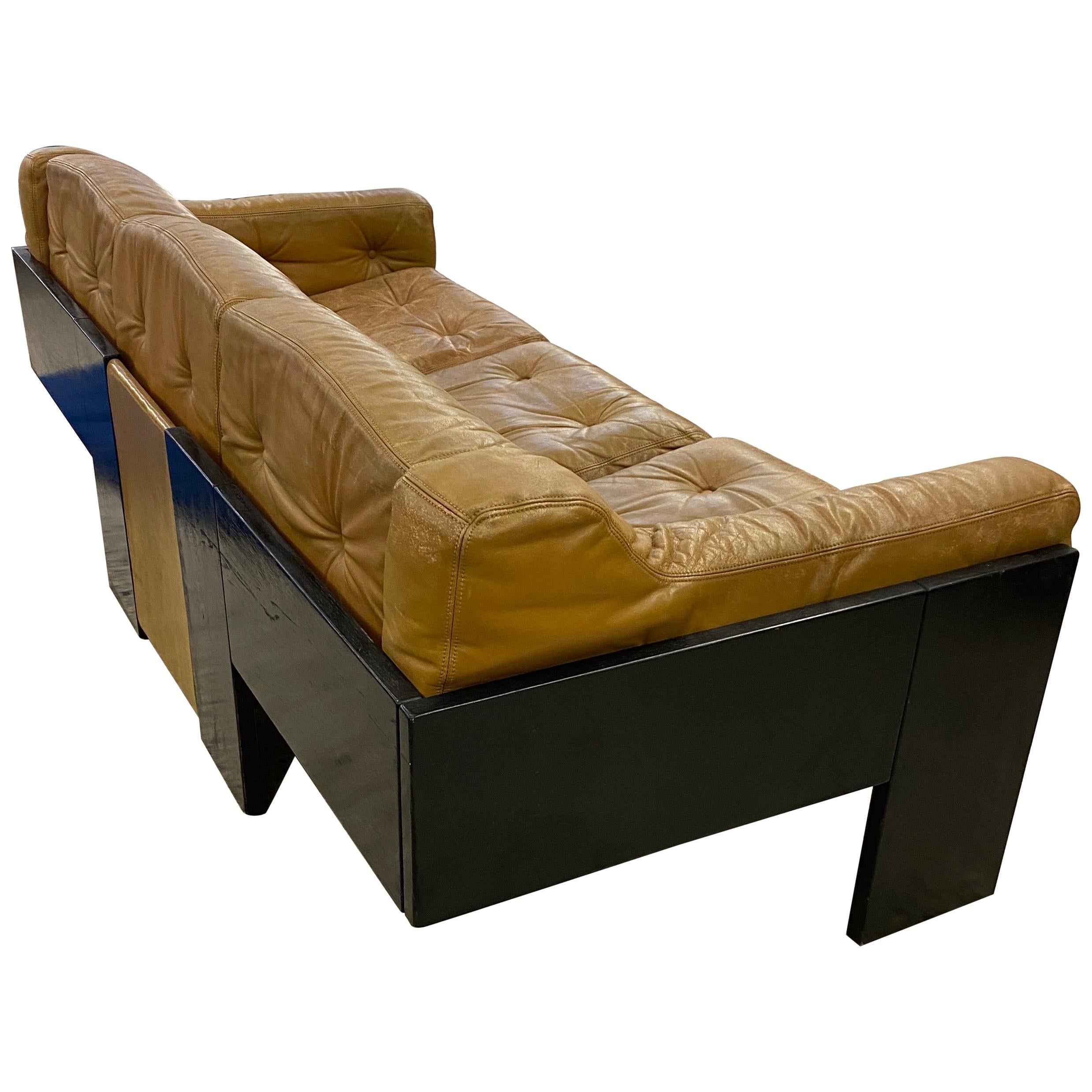 Erik De Forse ,  Sofa in lacquered wood and leather circa 1960