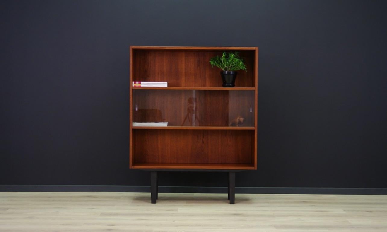 Midcentury bookshelf - a library from the 1960s-1970s, minimalist form - Danish design produced by Clausen & Søn. Bookcase finished with teak veneer. An additional advantage is elegant glass. Preserved in good condition (minor scratches) - directly
