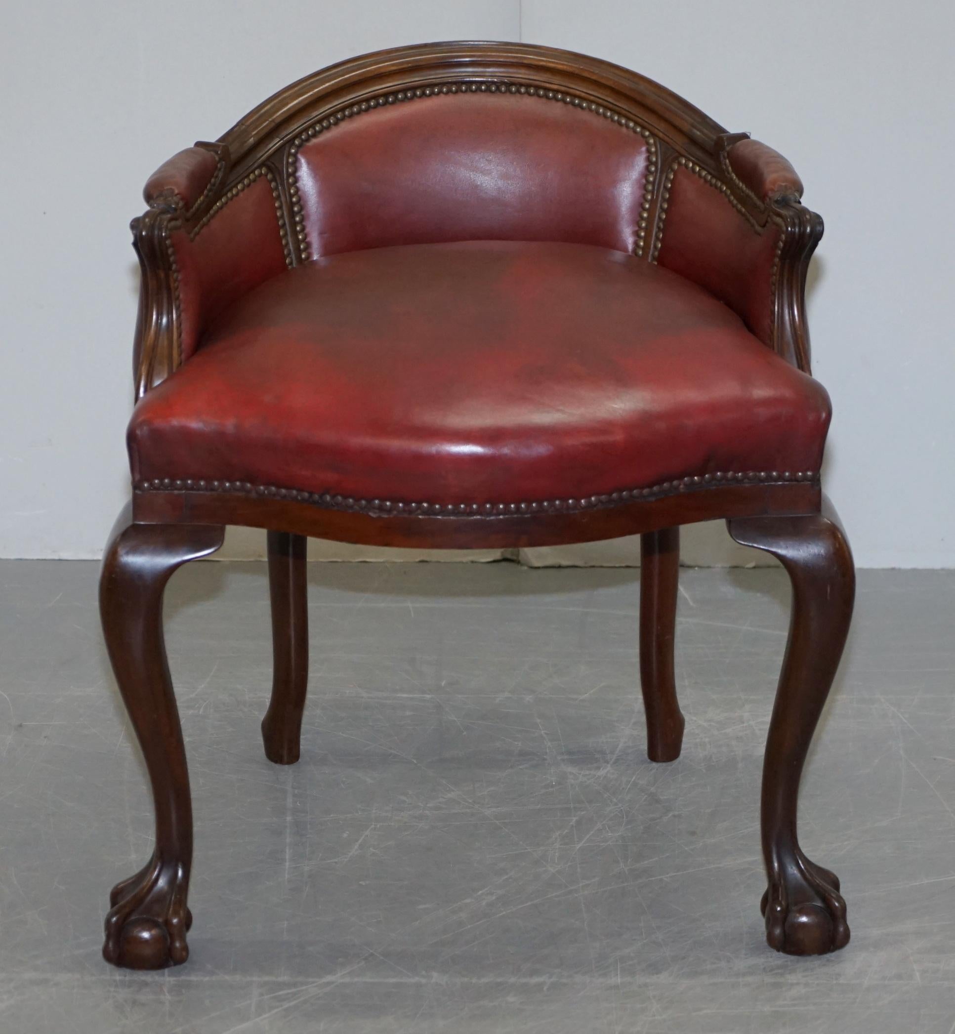 We are delighted to offer for sale this lovely circa 1900 hand carved hardwood framed small chair with oxblood leather upholstery and Claw & Ball cabriolet legs

A good looking decorative and well made piece. I’m 6’4 tall and have used this as an