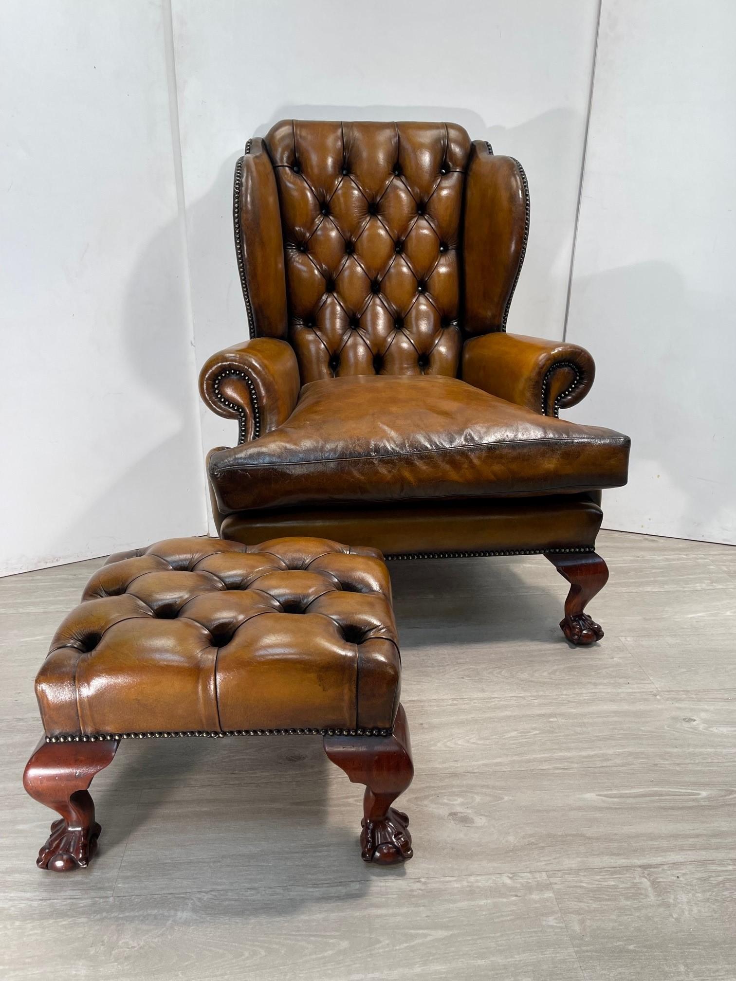 We are delighted to offer for sale this Sublime vintage, fully restored, Brown Leather Chesterfield Wingback armchair and matching footstool with over sized hand carved Claw & Ball feet

A very good looking well made and decorative pair, this is a