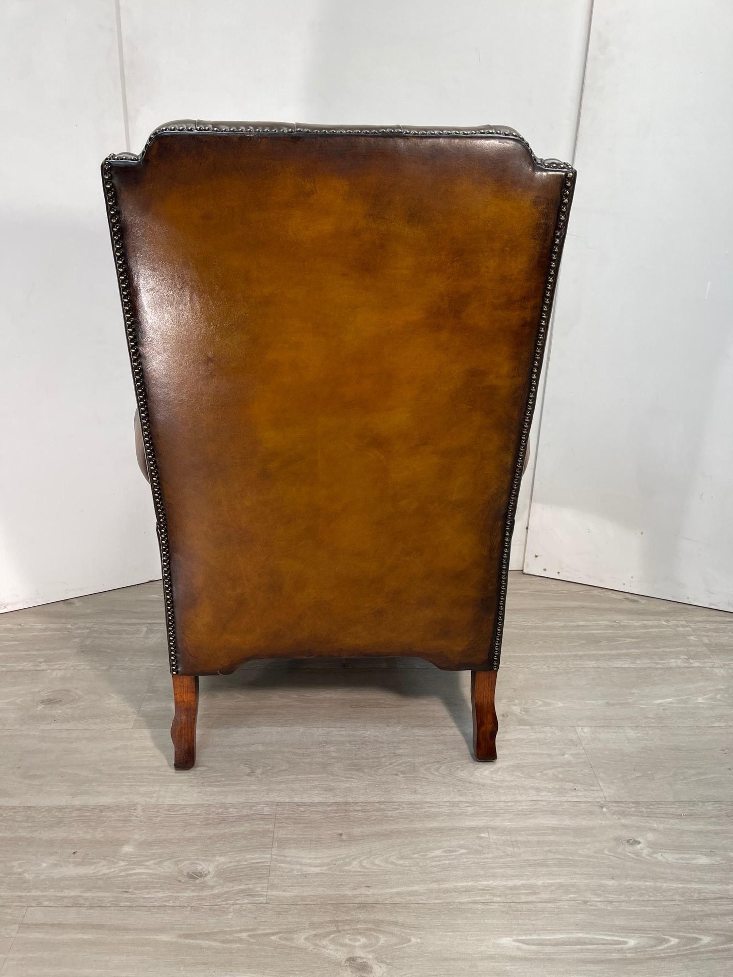 20th Century Claw & Ball Hand Dyed Brown leather Chesterfield wingback armchair and footstool