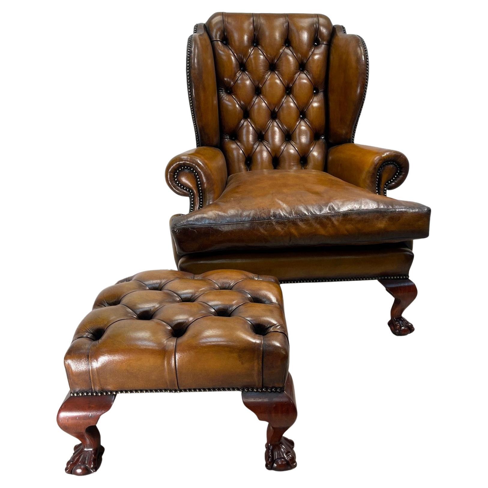 Claw and Ball Hand Dyed Brown leather Chesterfield wingback armchair and  footstool For Sale at 1stDibs