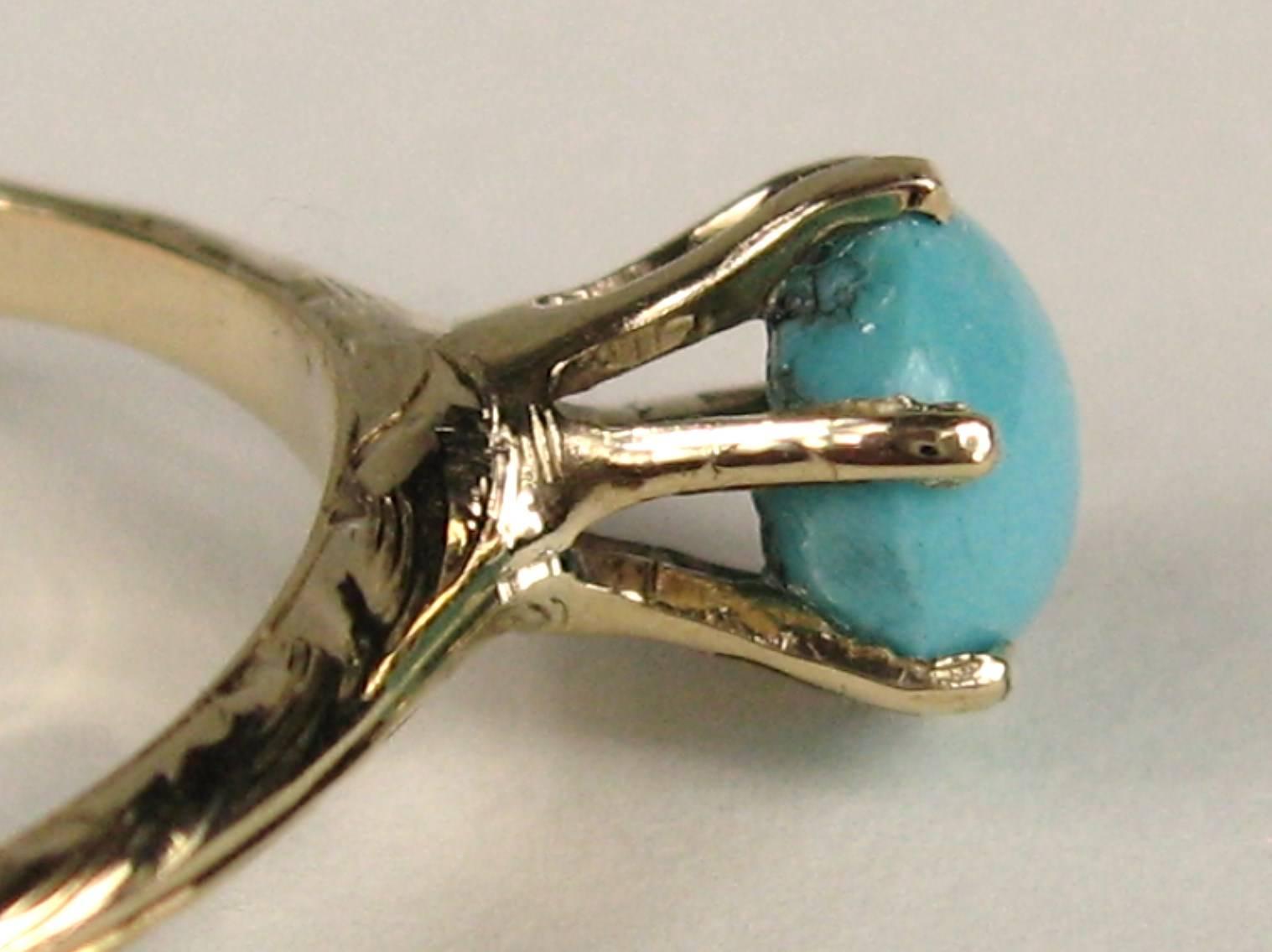 gold ring with turquoise stone