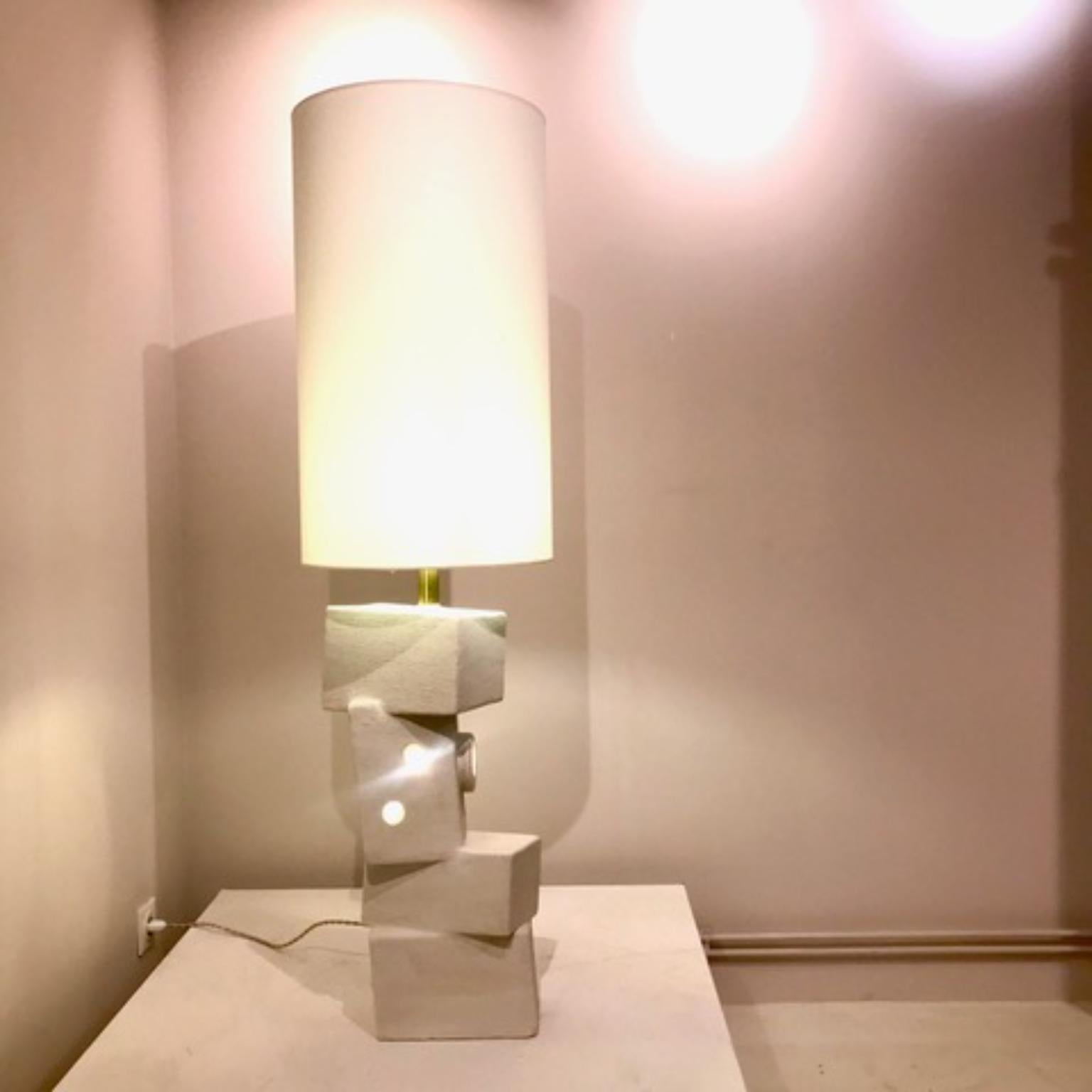 Clay Double Lighting Lamp by Frederic Texier
Dimensions: W 25 x D 16 x H 144 cm. 
Materials: Concrete coated with lime and cement. Metal part : brass. Lampshade : linen. 
Color: Clay.

Artist Frédéric Texier expresses a passion for craftsmanship