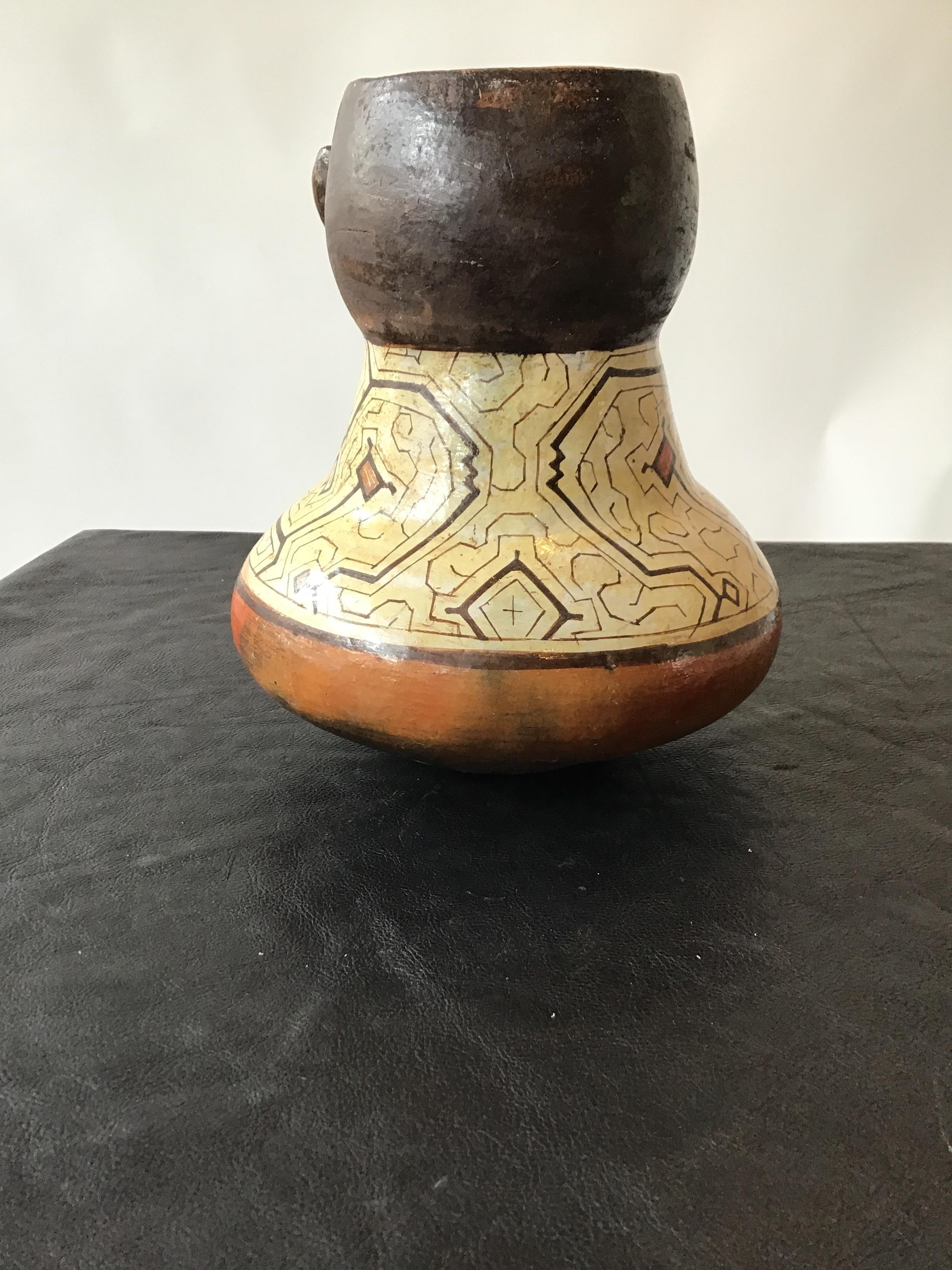 Shipibo Peruvian Clay Face Vase For Sale 1