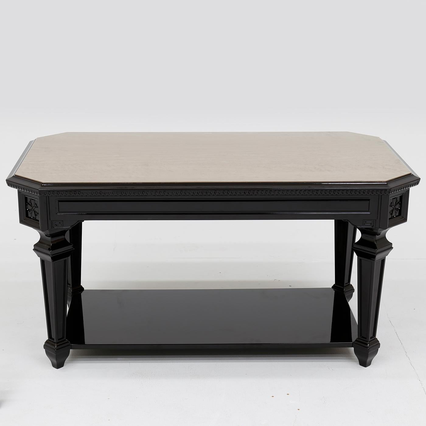 An exquisite combination of refined materials, this coffee table will make a statement in both a classic or modern decor thanks to its simple yet charming design. Distinguished by an elegant polished finish, the wooden base structure features four