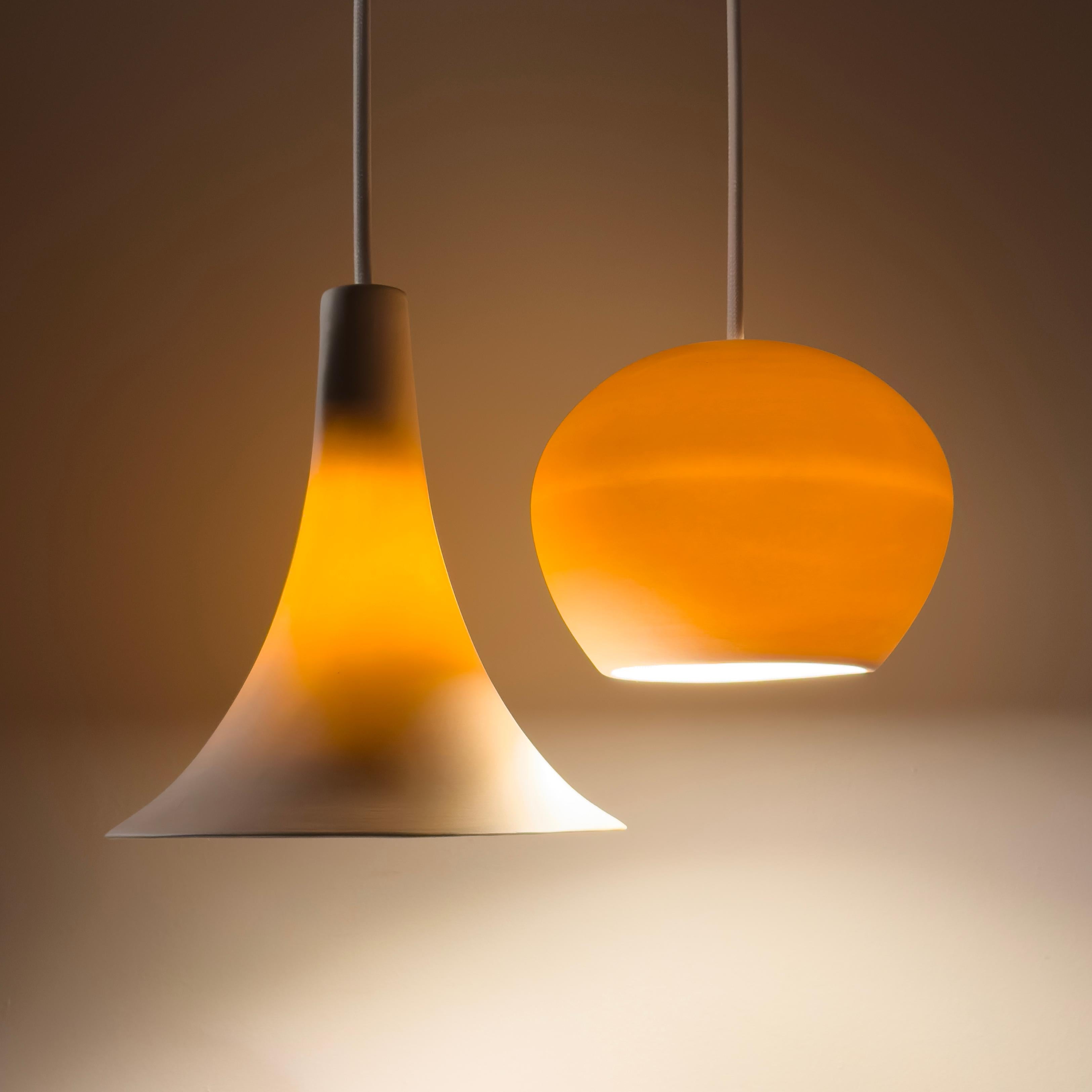 Elevate your space with our stylish and versatile CLAYLIGHT CRESCENT. Whether your space is contemporary or modern, maximalist or minimalist, this handcrafted porcelain chandelier is a statement piece that will suit your space. Especially popular in
